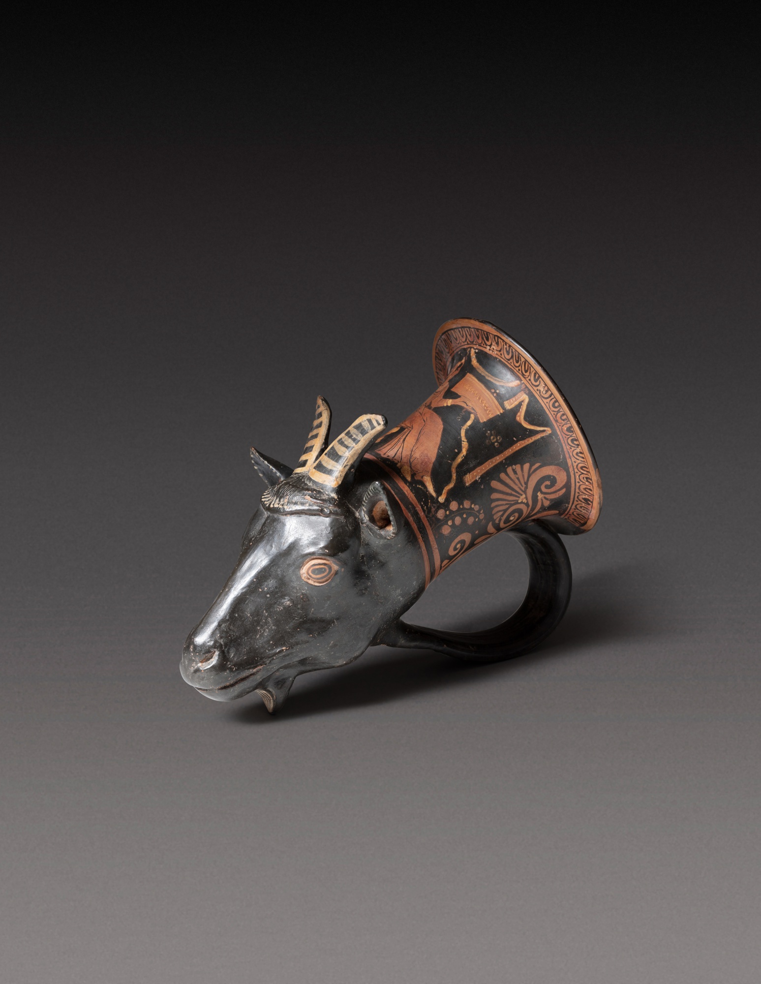 An Apulian Red-figured Rhyton, circa 350-330 B.C. — An Apulian Red-figured Rhyton, circa 350-330 B.C.