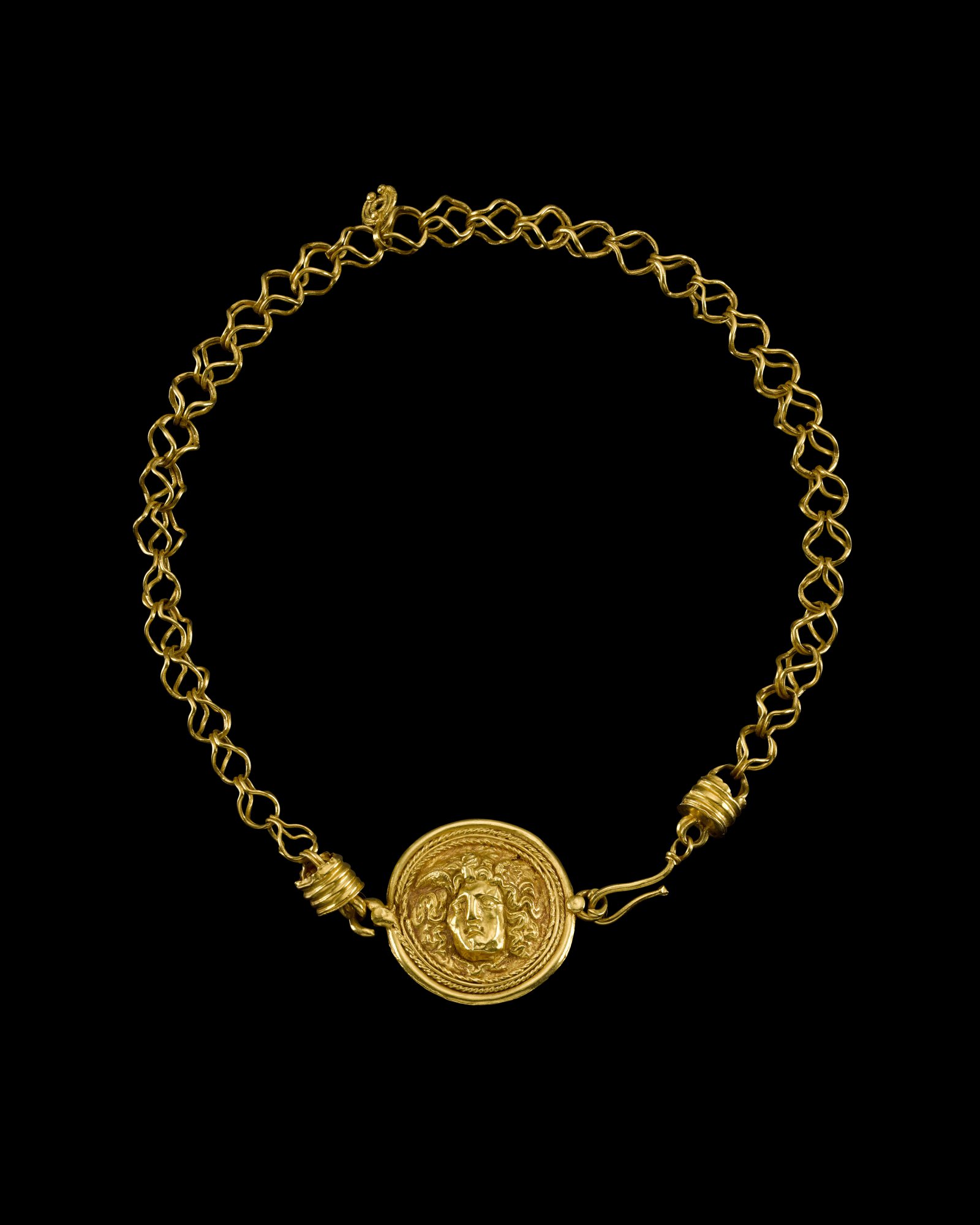 A Roman Gold Necklace and Pendant, circa 1st/3rd Century A.D. — A Roman Gold Necklace and Pendant, circa 1st/3rd Century A.D.