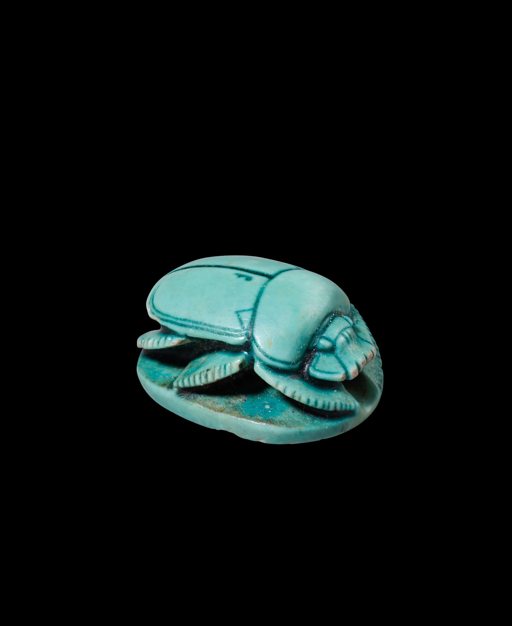 An Egyptian Turquoise-glazed Steatite Scarab — An Egyptian Turquoise-glazed Steatite Scarab, 18th Dynasty, period of Queen Hatshepsut, 1479-1458 B.C.
