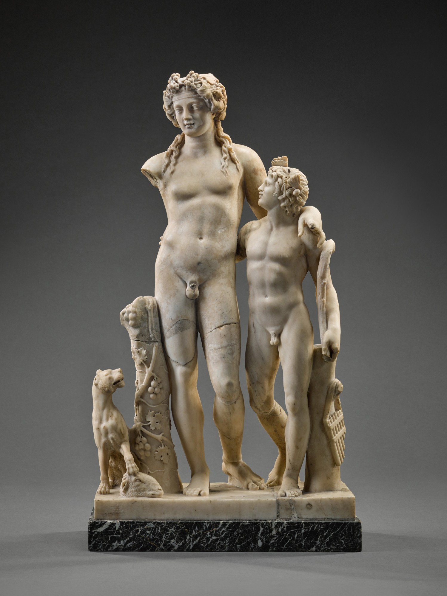 A Roman Marble Group of Dionysos and a Satyr — A Roman Marble Group of Dionysos and a Satyr, circa 1st Century A.D., with late 18th/early 19th Century Restorations