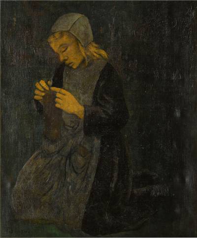 Jeune bretonne tricotant 