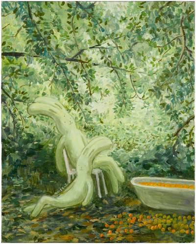 Two bunnies with a bathtub with oranges