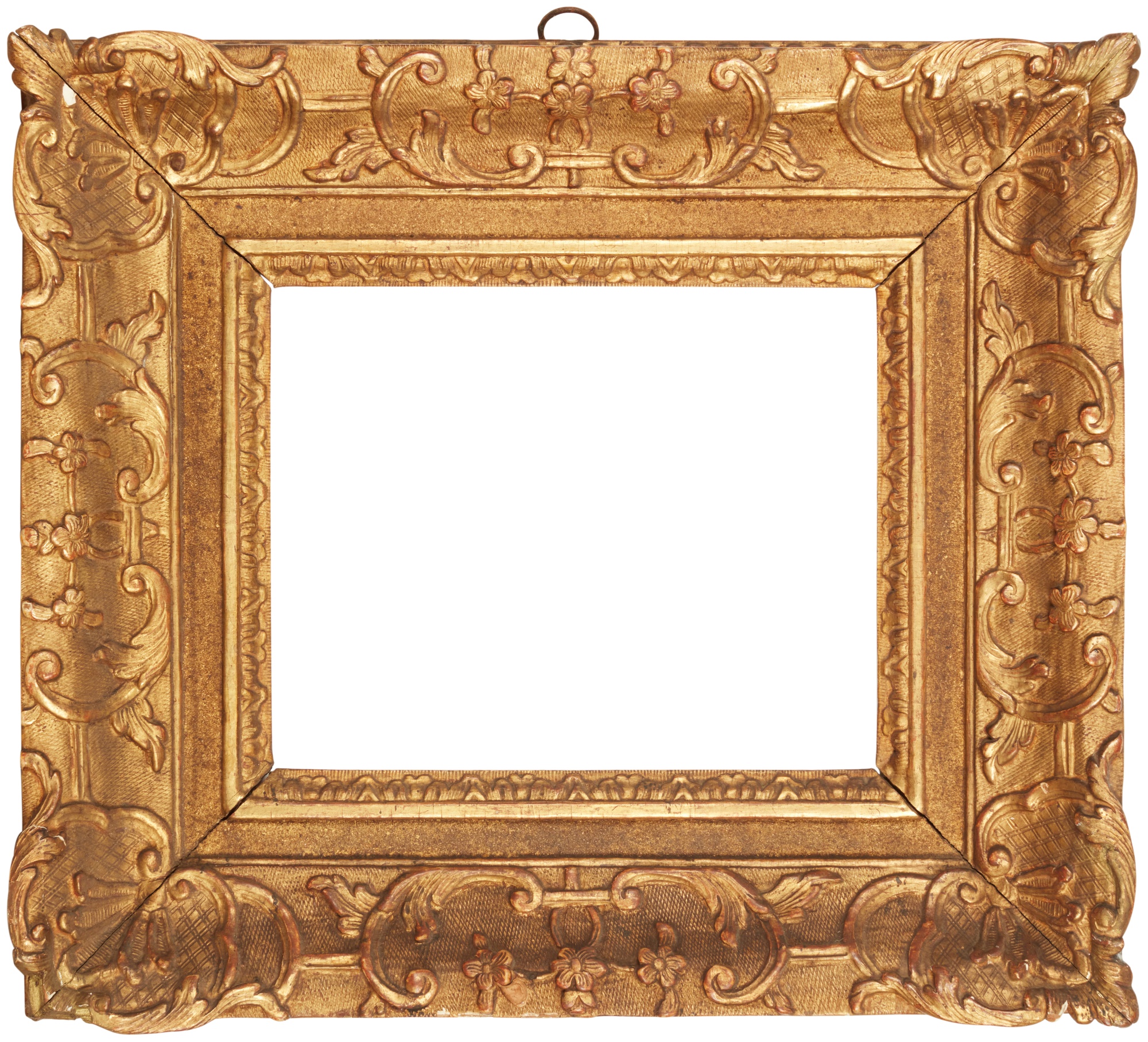 A Louis XIV carved giltwood frame, landscape format with antique hanger — A Louis XIV carved giltwood frame, landscape format with antique hanger