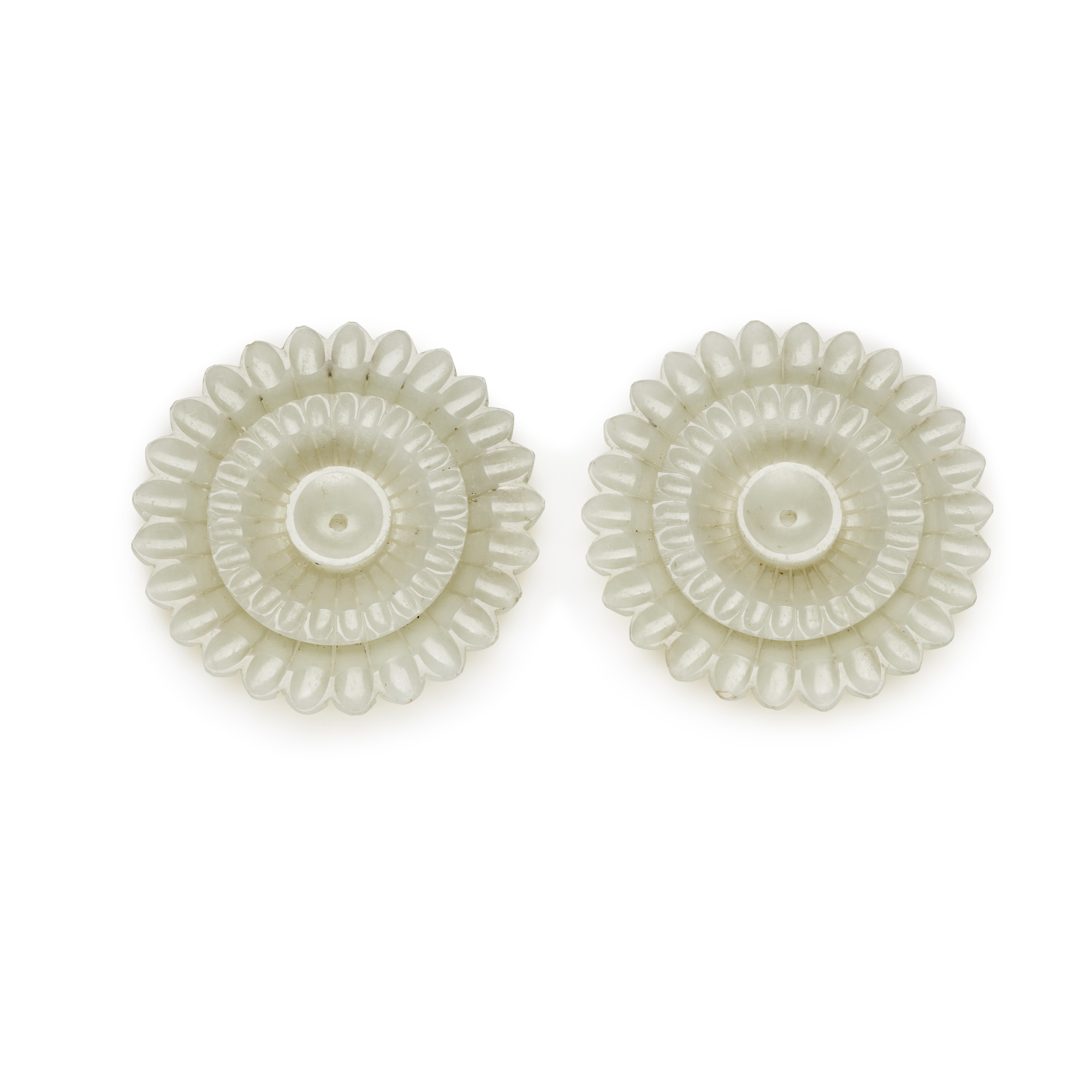 Two pale celadon jade ‘chrysanthemum’ plaques, 19th / 20th century — Two pale celadon jade ‘chrysanthemum’ plaques, 19th / 20th century