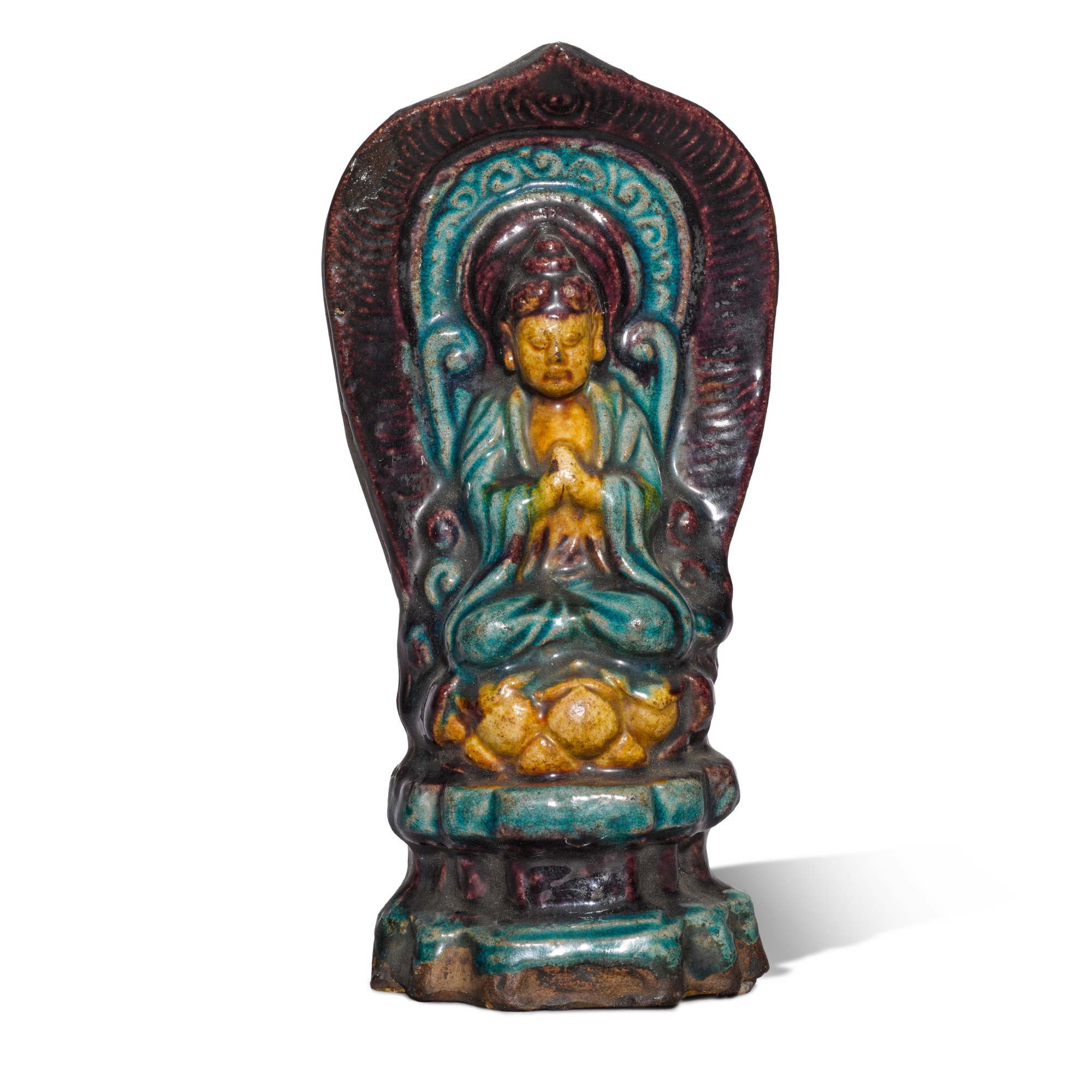 A Fahua-glazed figure of a Buddha — A Fahua-glazed figure of a Buddha, Ming dynasty, 16th century 