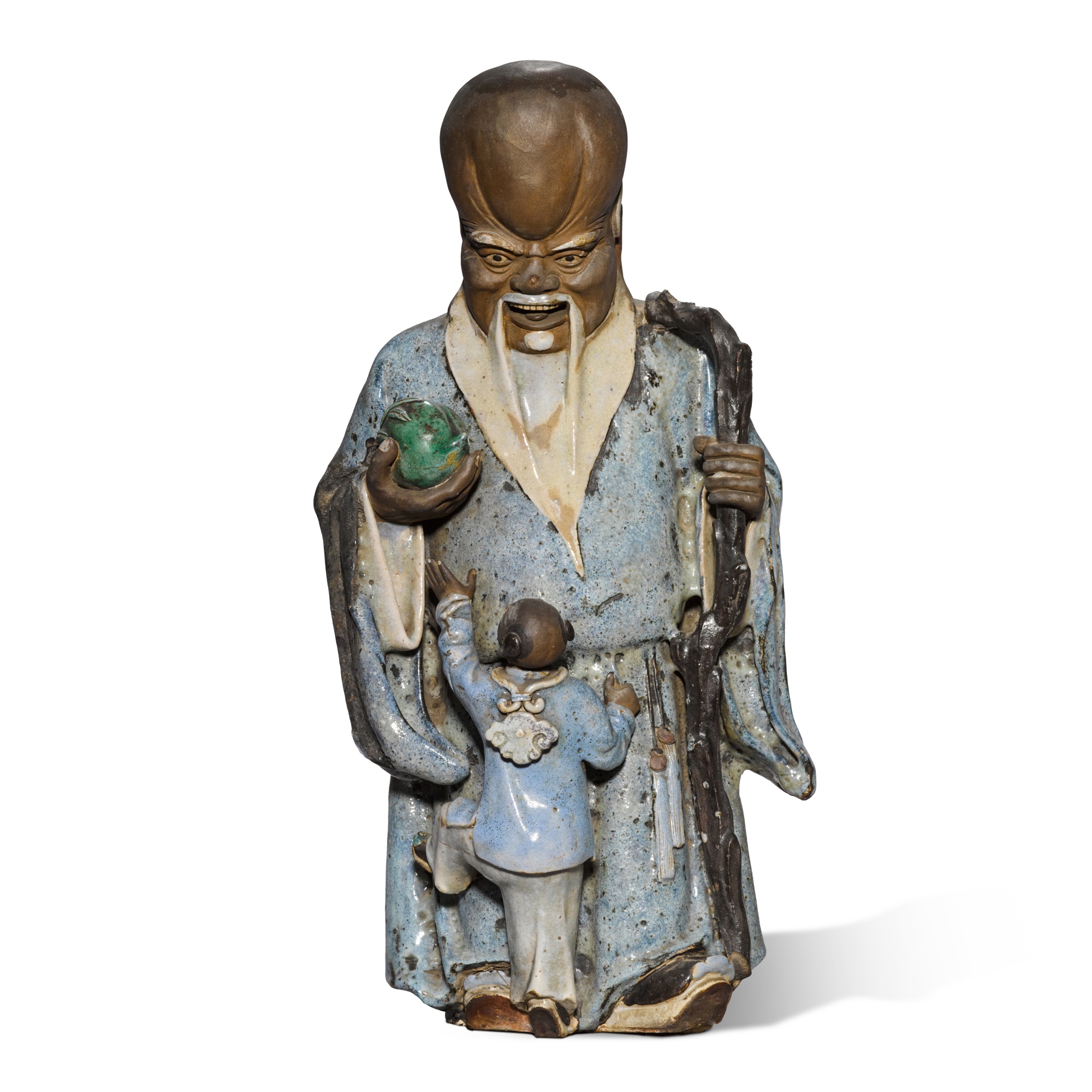 A 'Shiwan' figure of Shoulao, — A 'Shiwan' figure of Shoulao, Qing dynasty, early 19th century 