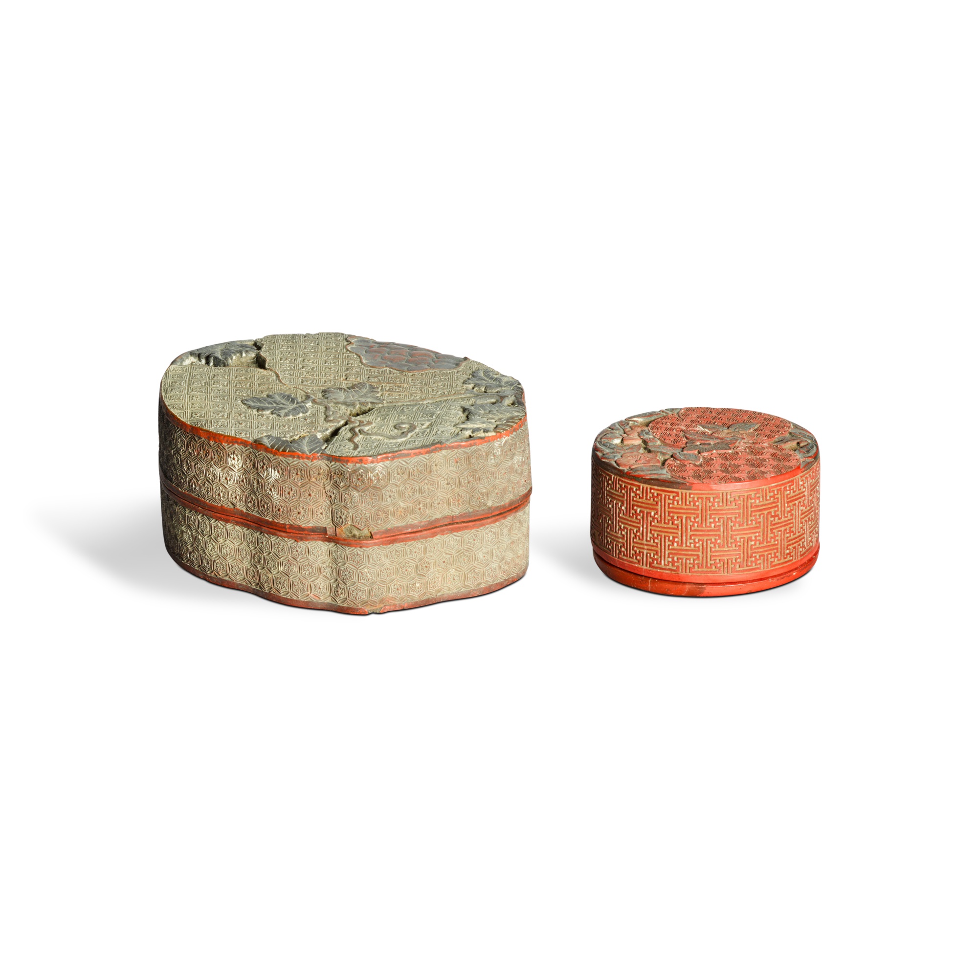 Two carved cinnabar lacquer boxes and covers, — Two carved cinnabar lacquer boxes and covers, Qing dynasty, 18th / 19th century 