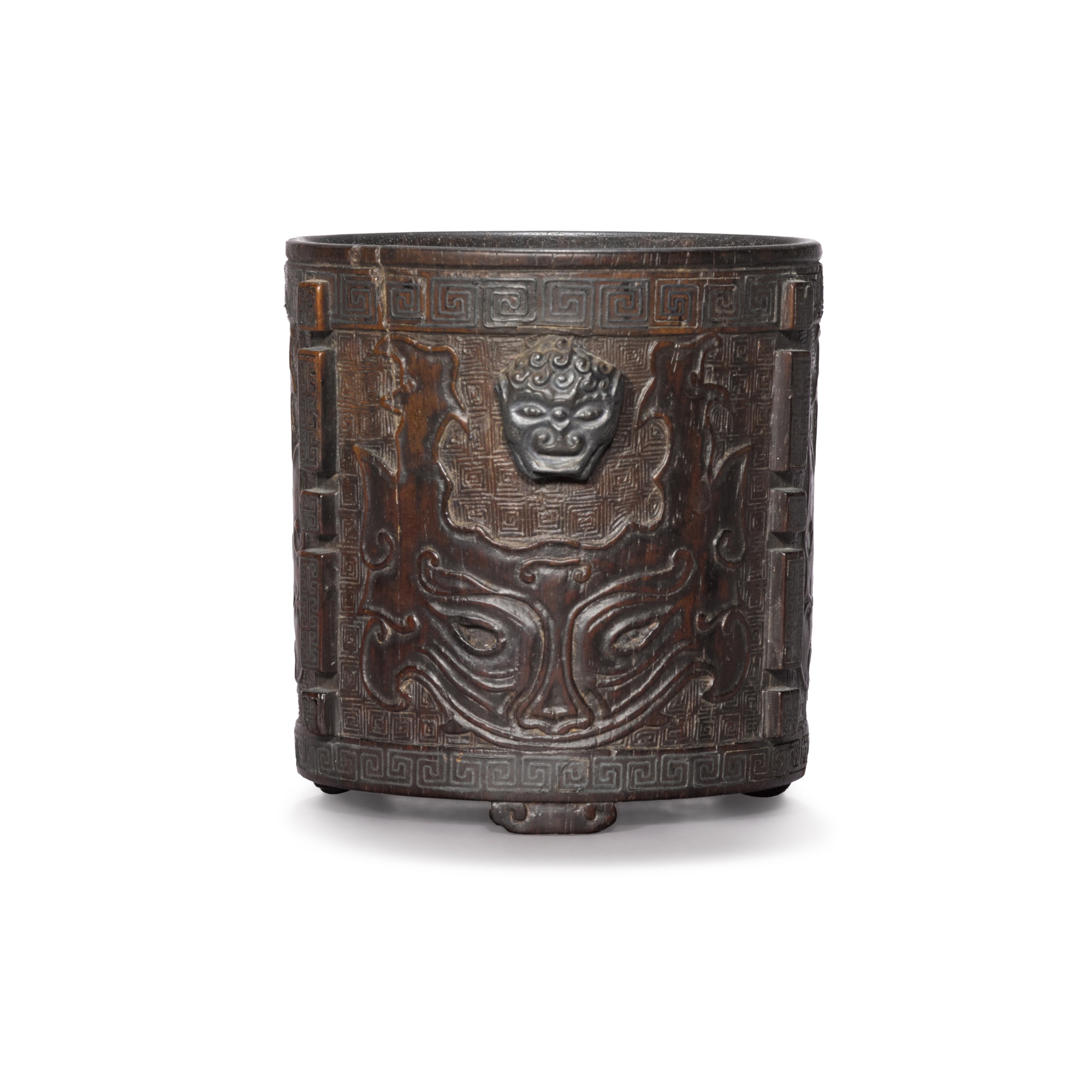 A silver-inlaid 'zitan' brush holder, — A silver-inlaid 'zitan' brush holder, Qing dynasty, 18th century 