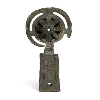 An archaic bronze chariot bell, Zhou dynasty 
