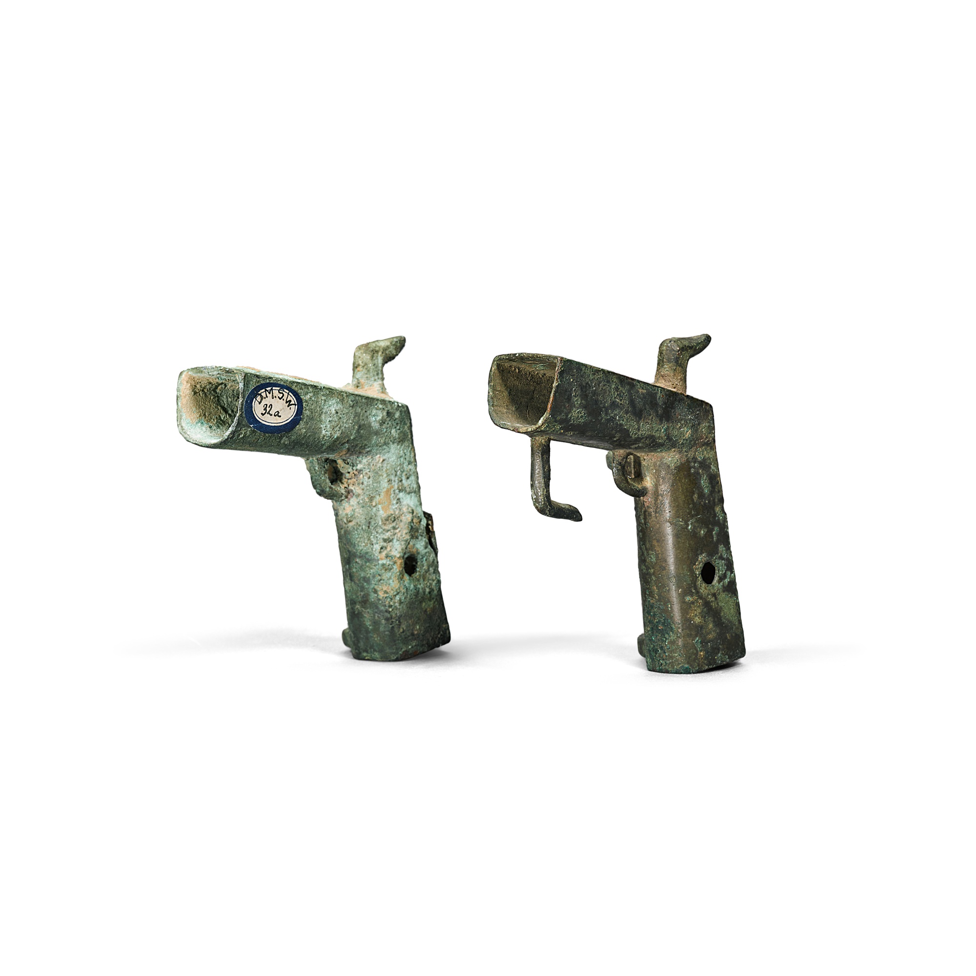Two archaic bronze chariot fittings,