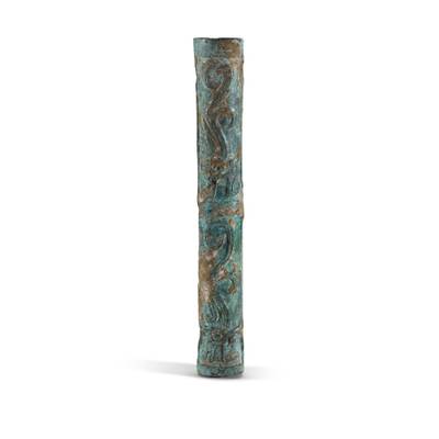 An archaic bronze tubular ornament,