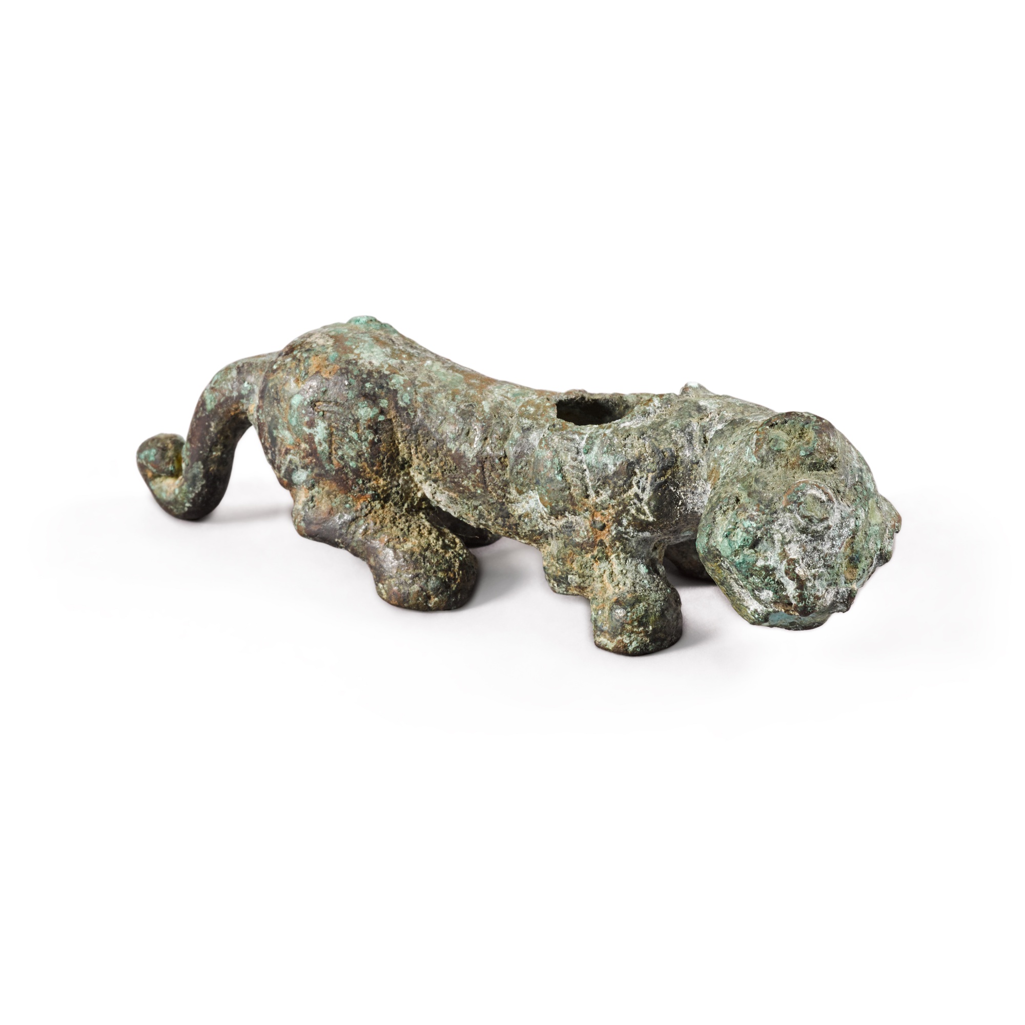 An archaic bronze figure of a crouching tiger-form support — An archaic bronze figure of a crouching tiger-form support, Eastern Zhou dynasty 