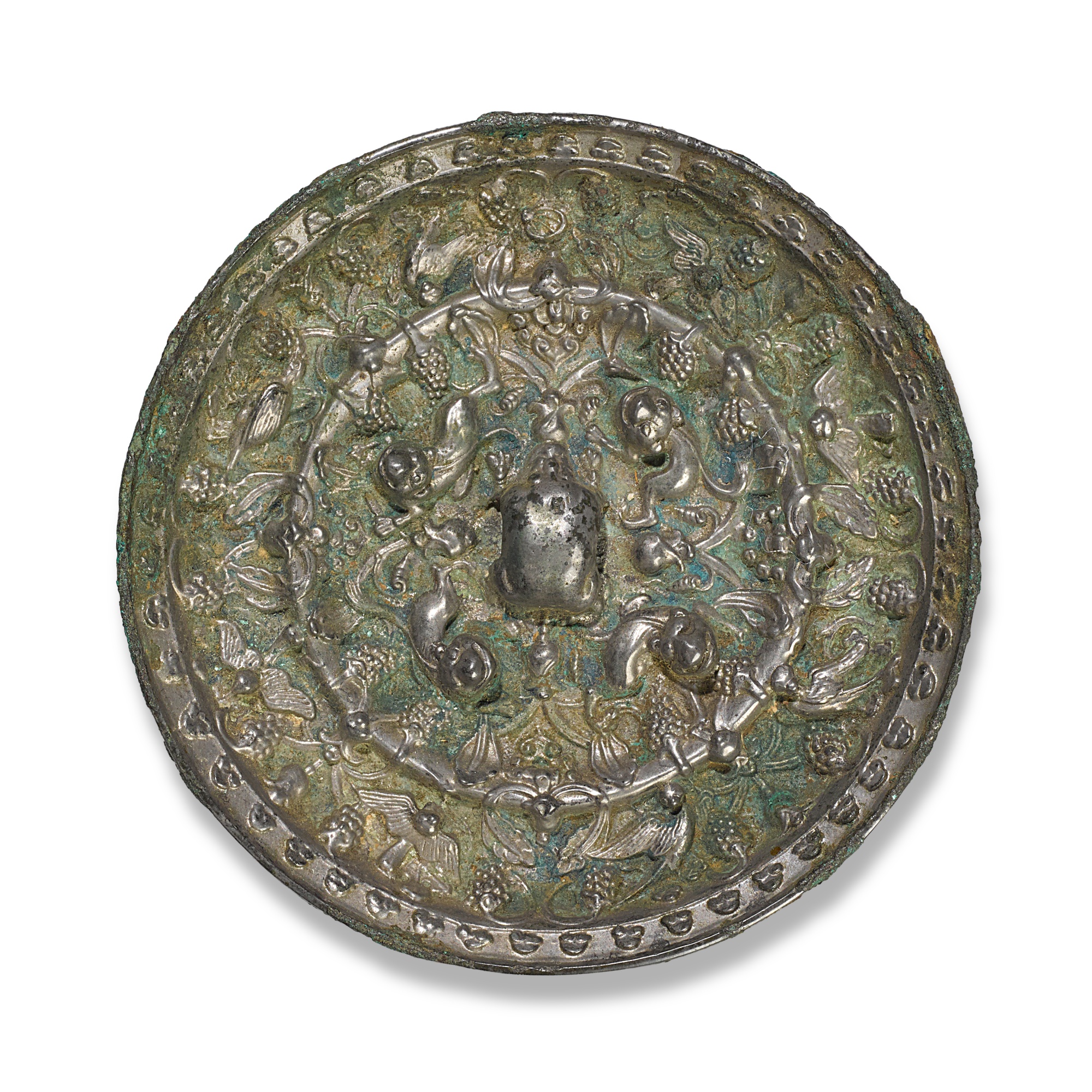 A silvered bronze mirror, — A silvered bronze mirror, Tang dynasty 