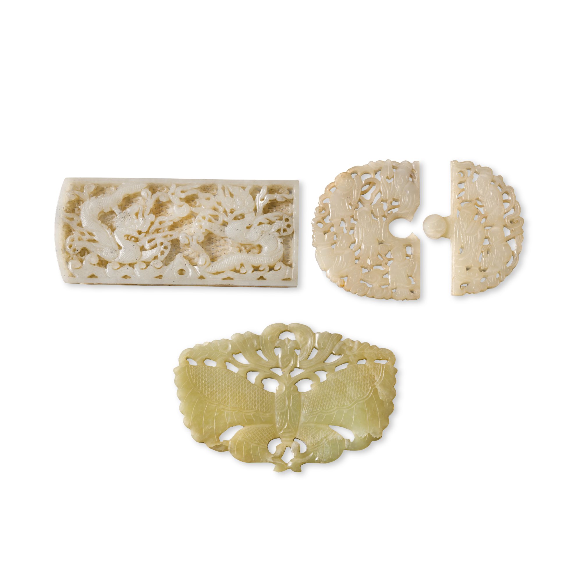 A reticulated celadon jade 'dragon' plaque, — A reticulated celadon jade 'dragon' plaque, Ming dynasty 