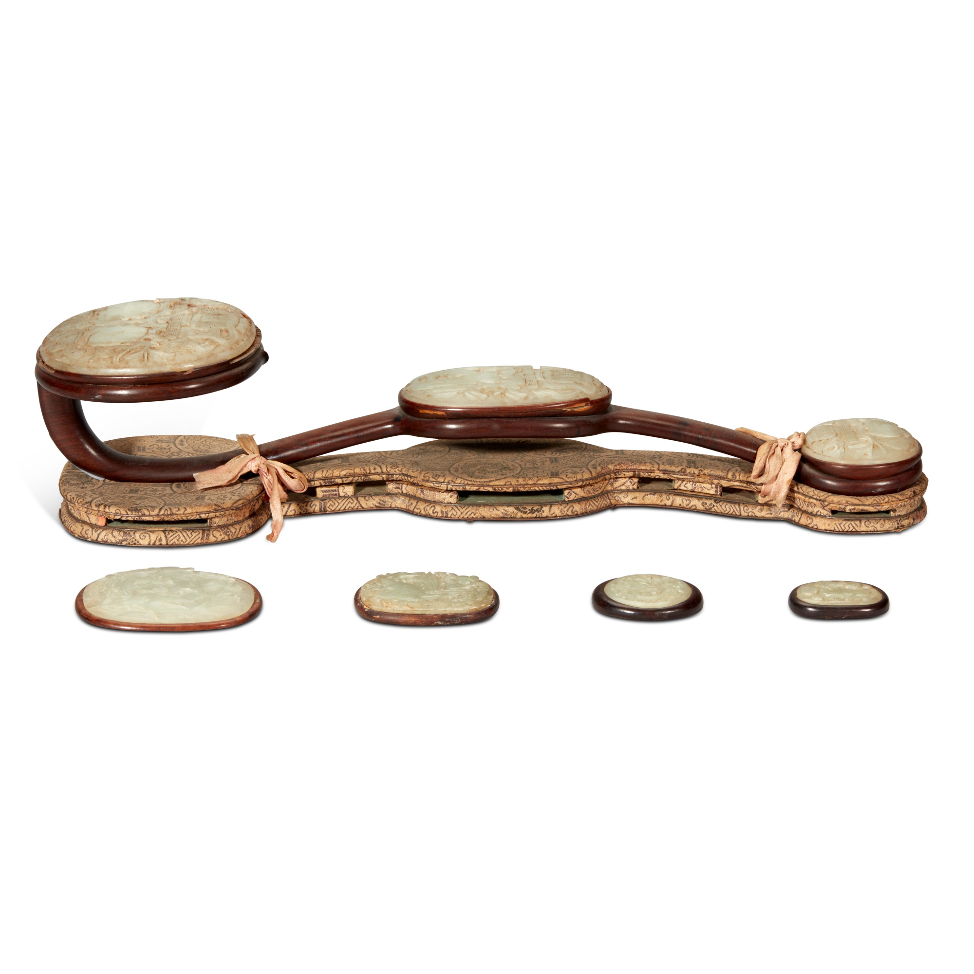 A celadon jade inlaid hardwood ruyi sceptre, — A celadon jade inlaid hardwood ruyi sceptre, Qing dynasty, 19th century 