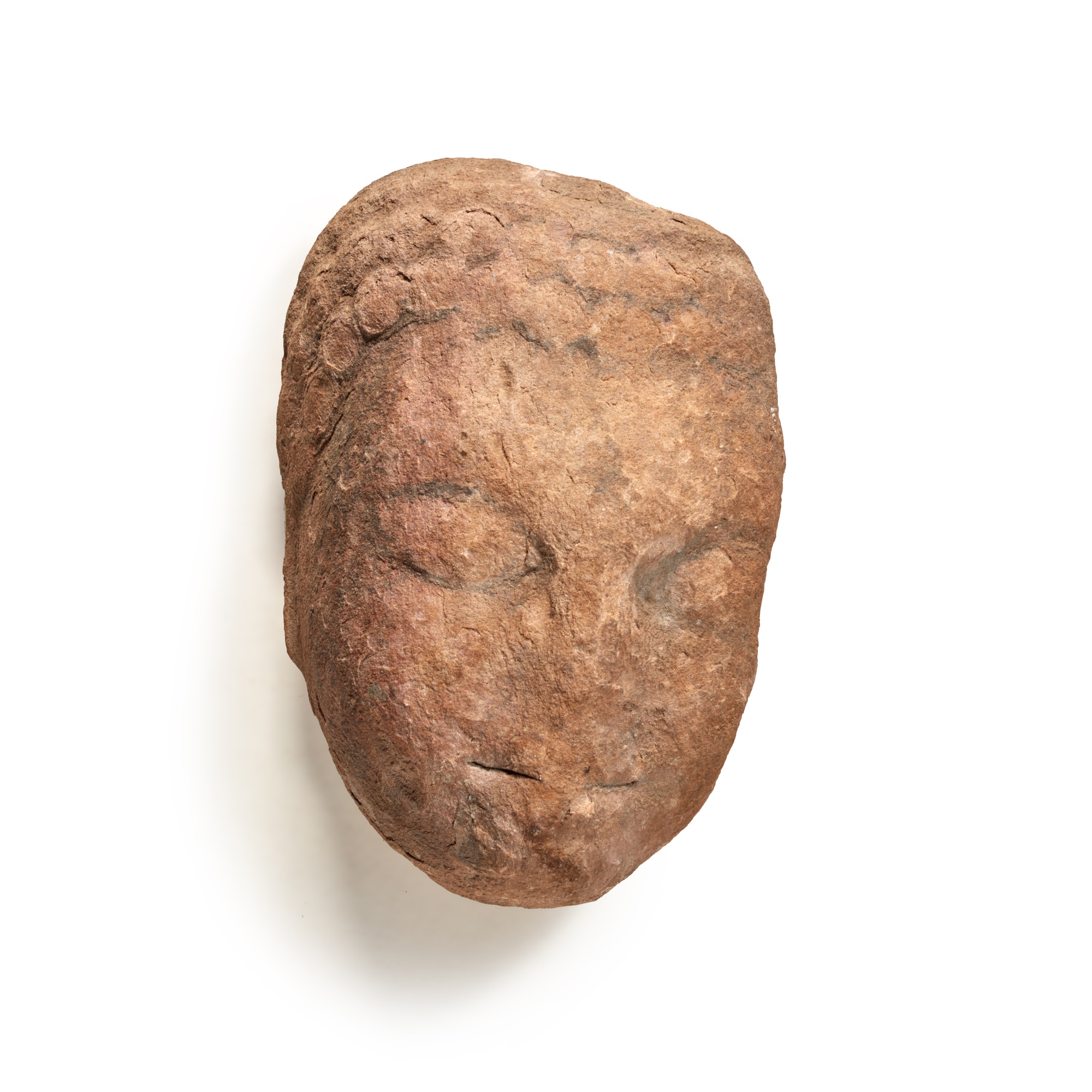 A fragmentary limestone head of a Buddha, — 北齊 石灰石雕佛首像