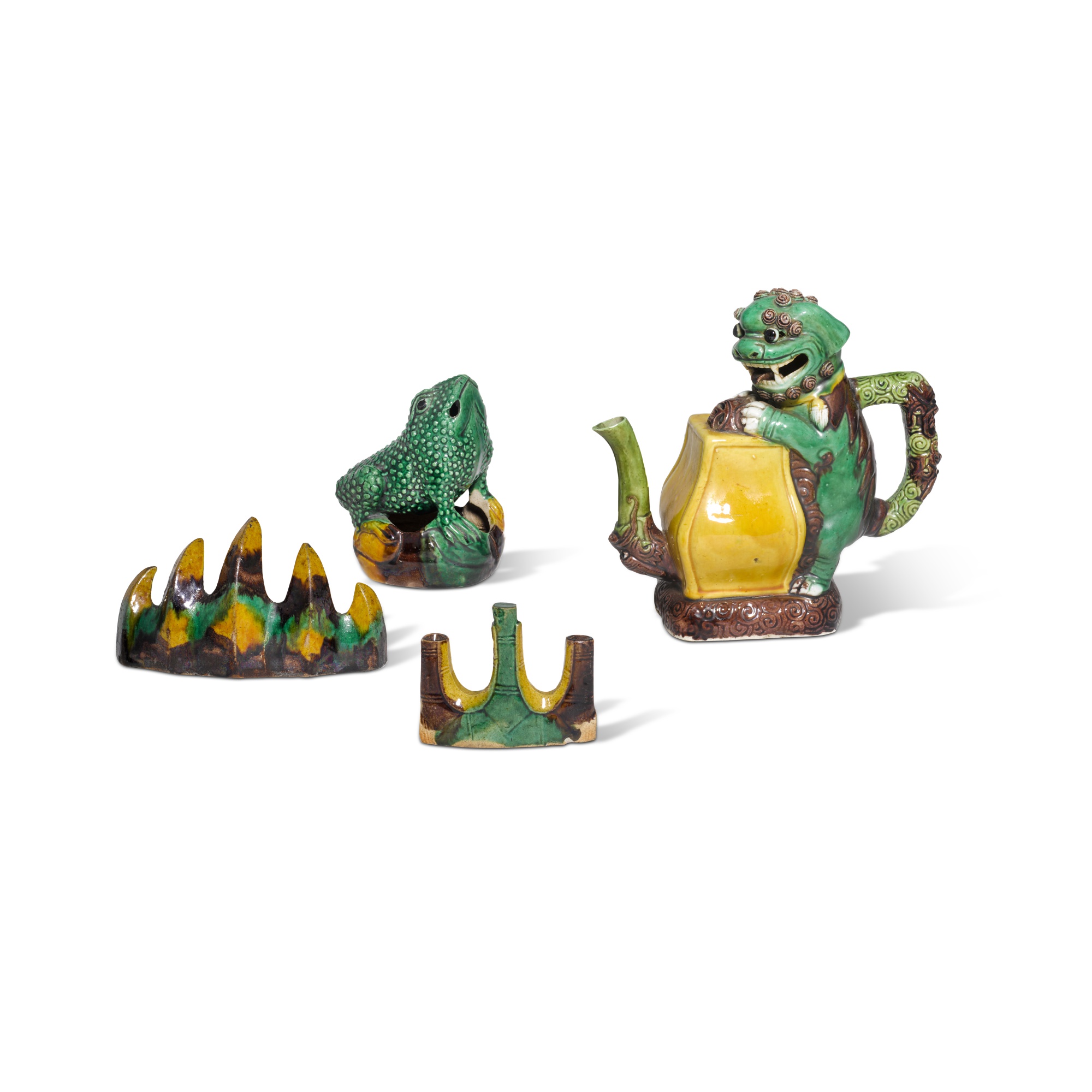 A group of four biscuit-enamelled sancai wares, — 清康熙 各式素三彩瓷器 一組四件