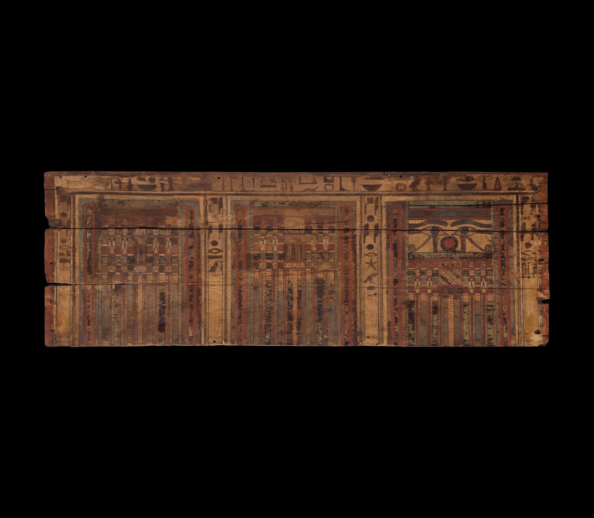 An Egyptian Polychrome Wood Sarcophagus Panel, 11th/12th Dynasty, 2081-1759 B.C.