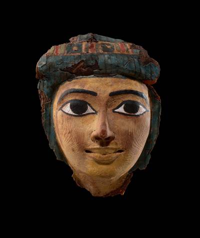 An Egyptian Polychrome Wood Mummy Mask