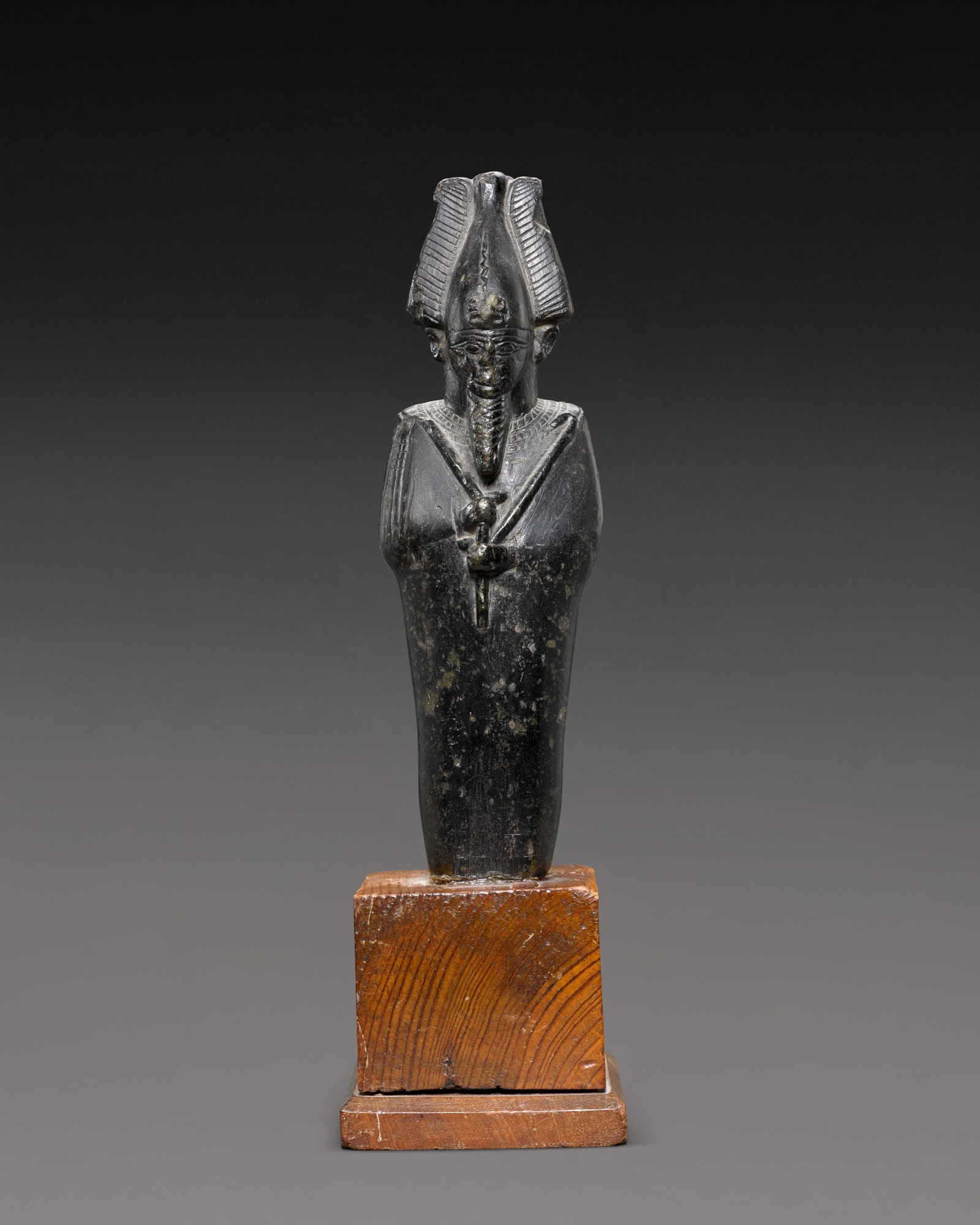 A Fragmentary Egyptian Black Serpentine Figure of Osiris — A Fragmentary Egyptian Black Serpentine Figure of Osiris, 26th Dynasty, 664-525 B.C.