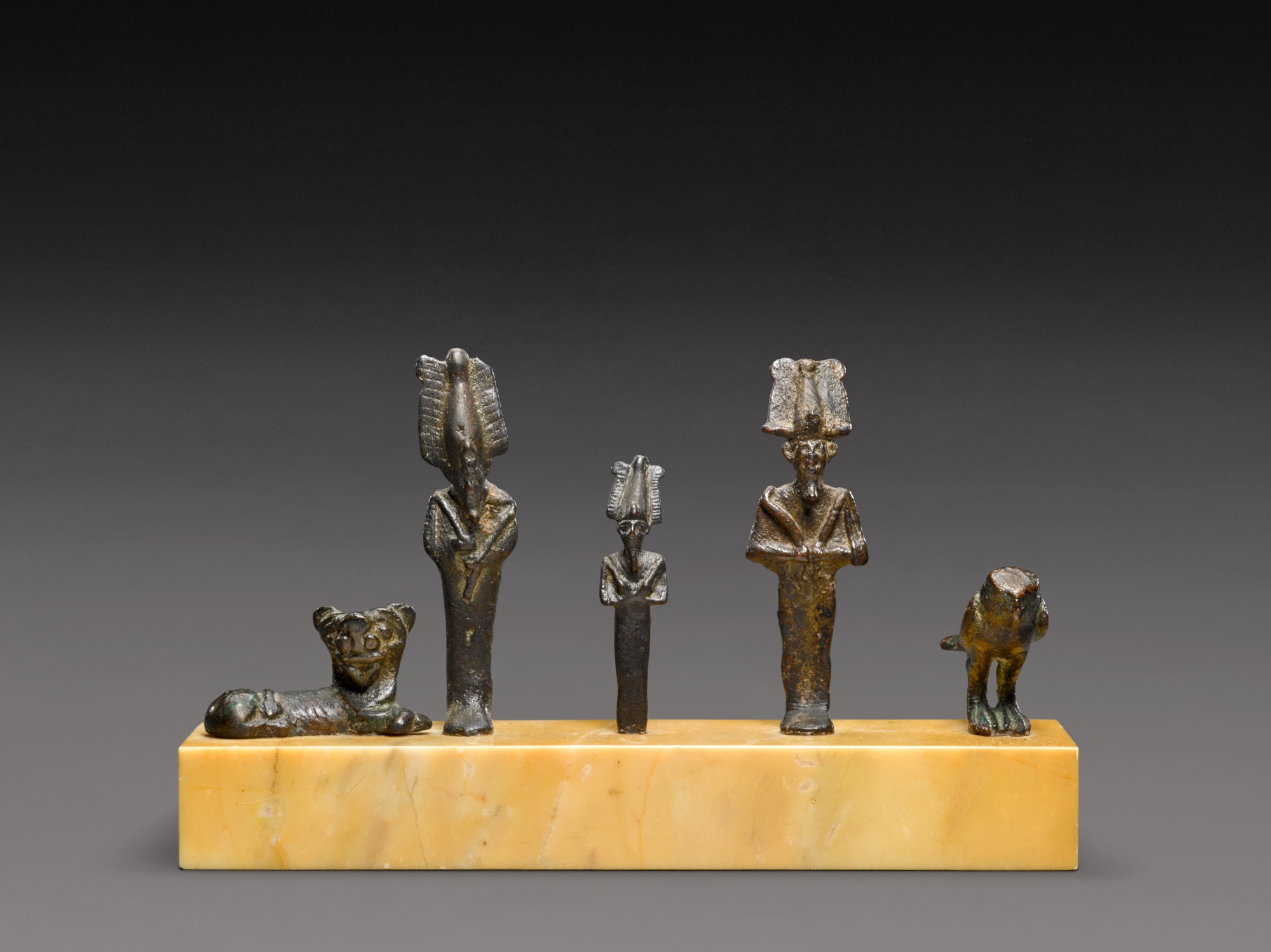 A Group of Five Small Egyptian Bronze Figures — A Group of Five Small Egyptian Bronze Figures, Late Period, 716-30 B.C.