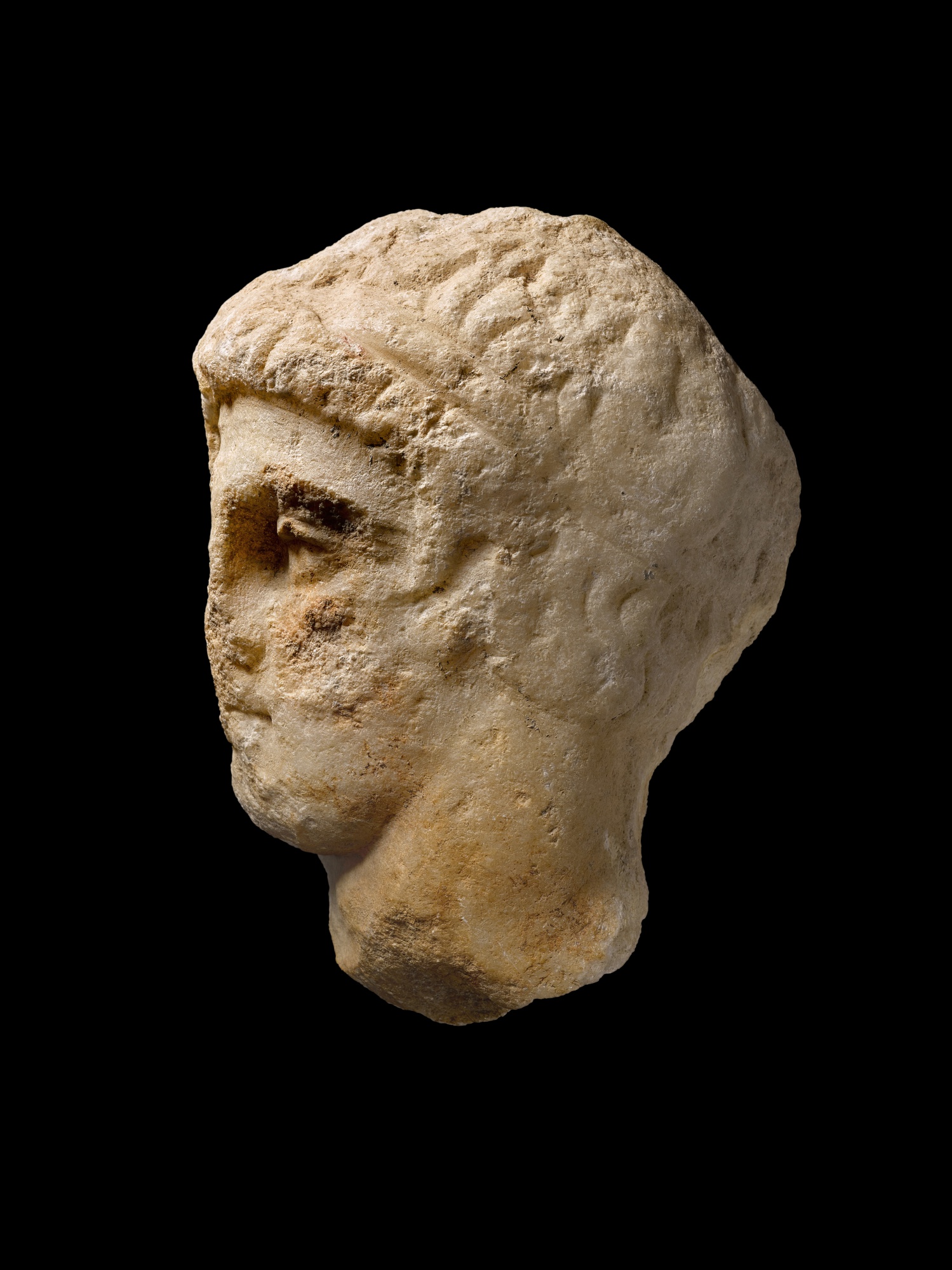 An Attic Marble Relief Head of a Youth — An Attic Marble Relief Head of a Youth, 4th Century B.C.
