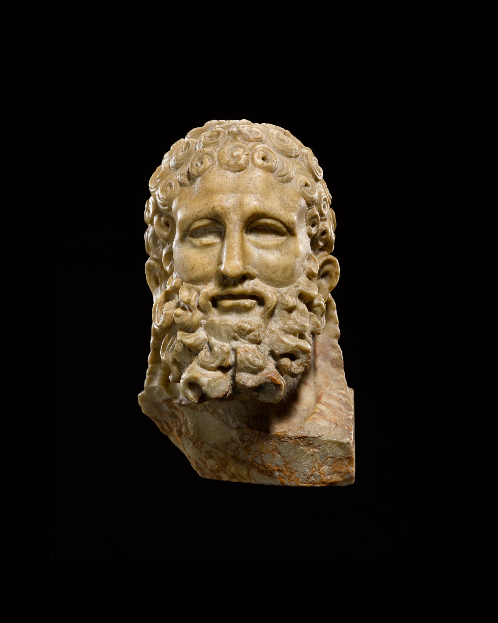 A Roman Giallo Antico Marble Herm Bust of Herakles — A Roman Giallo Antico Marble Herm Bust of Herakles, circa 2nd century A.D.