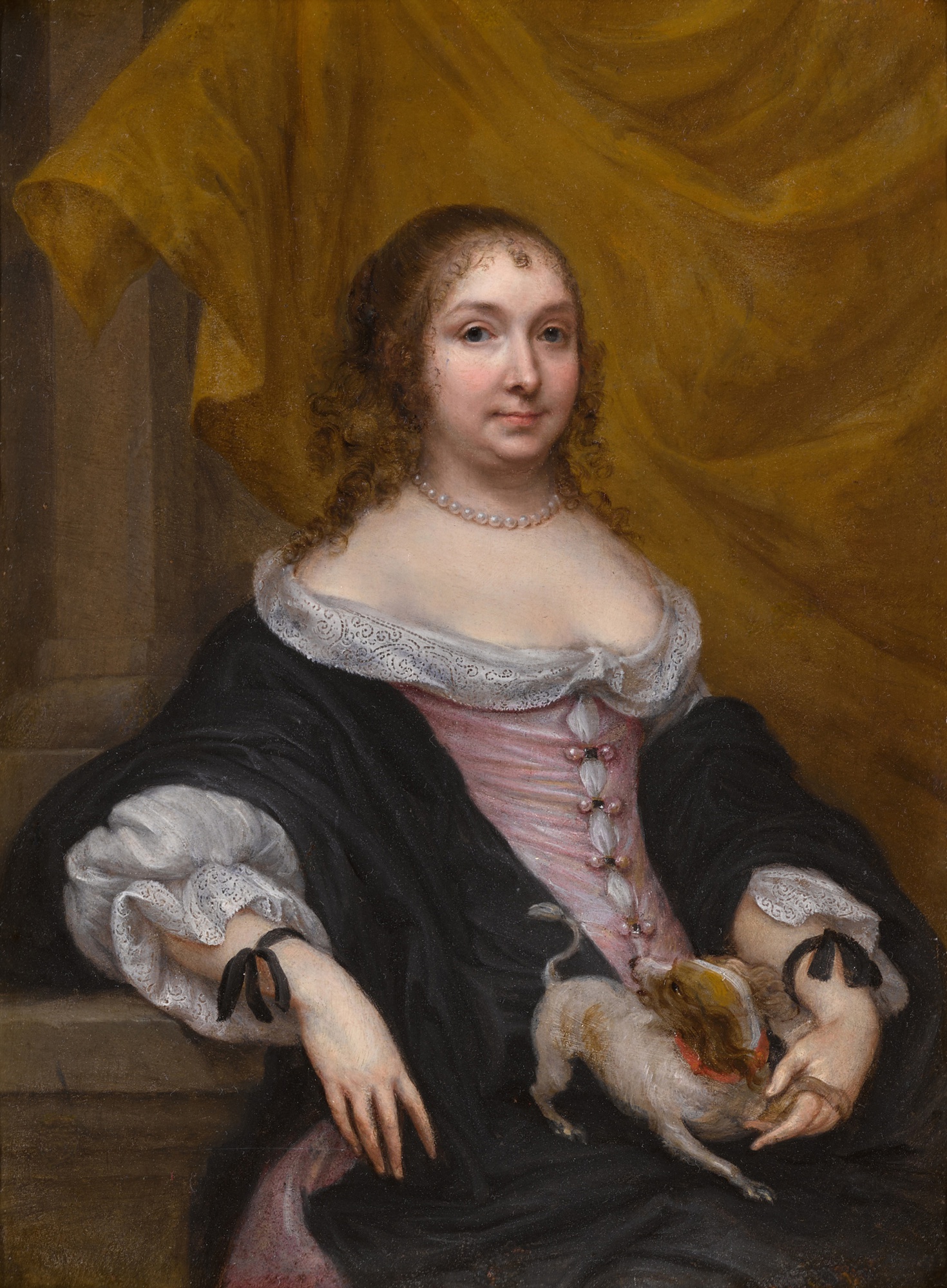 Portrait of a young woman with a dog