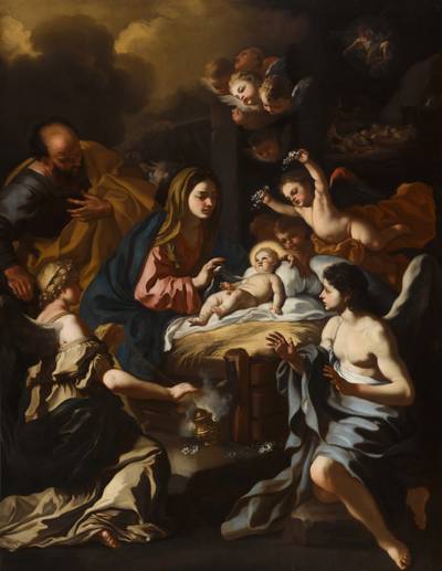 The Christ Child in the manger adored by angels