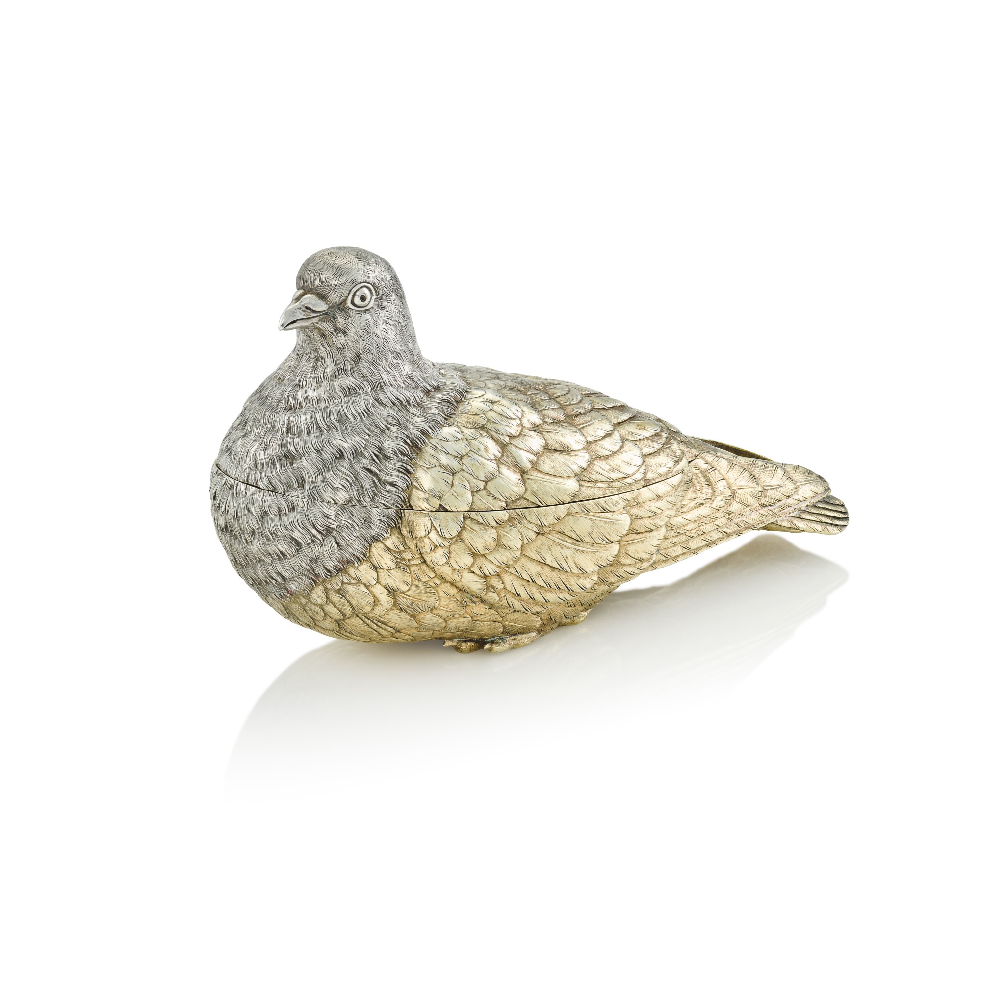 Unknown — A parcel-gilt silver table box in the form of a dove, maker's mark Cyrillic NS or IS, St Petersburg, circa 1890
