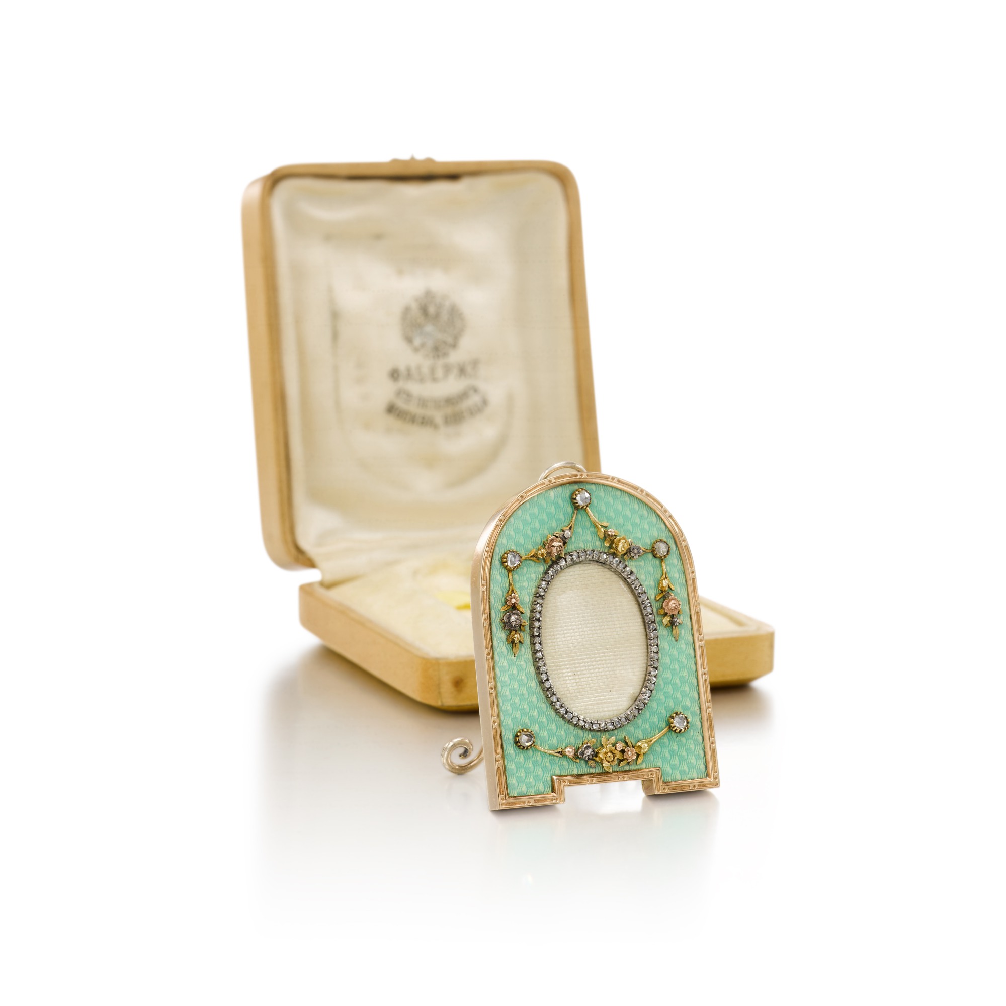 Unknown — A Fabergé jewelled, varicoloured gold and guilloché enamel miniature photograph frame, workmaster Victor Aarne, St Petersburg, circa 1900