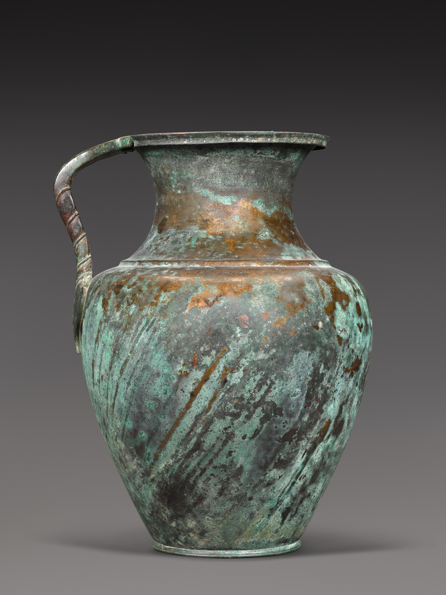 A Large Etruscan Bronze Jug — A Large Etruscan Bronze Jug, circa 5th Century B.C.