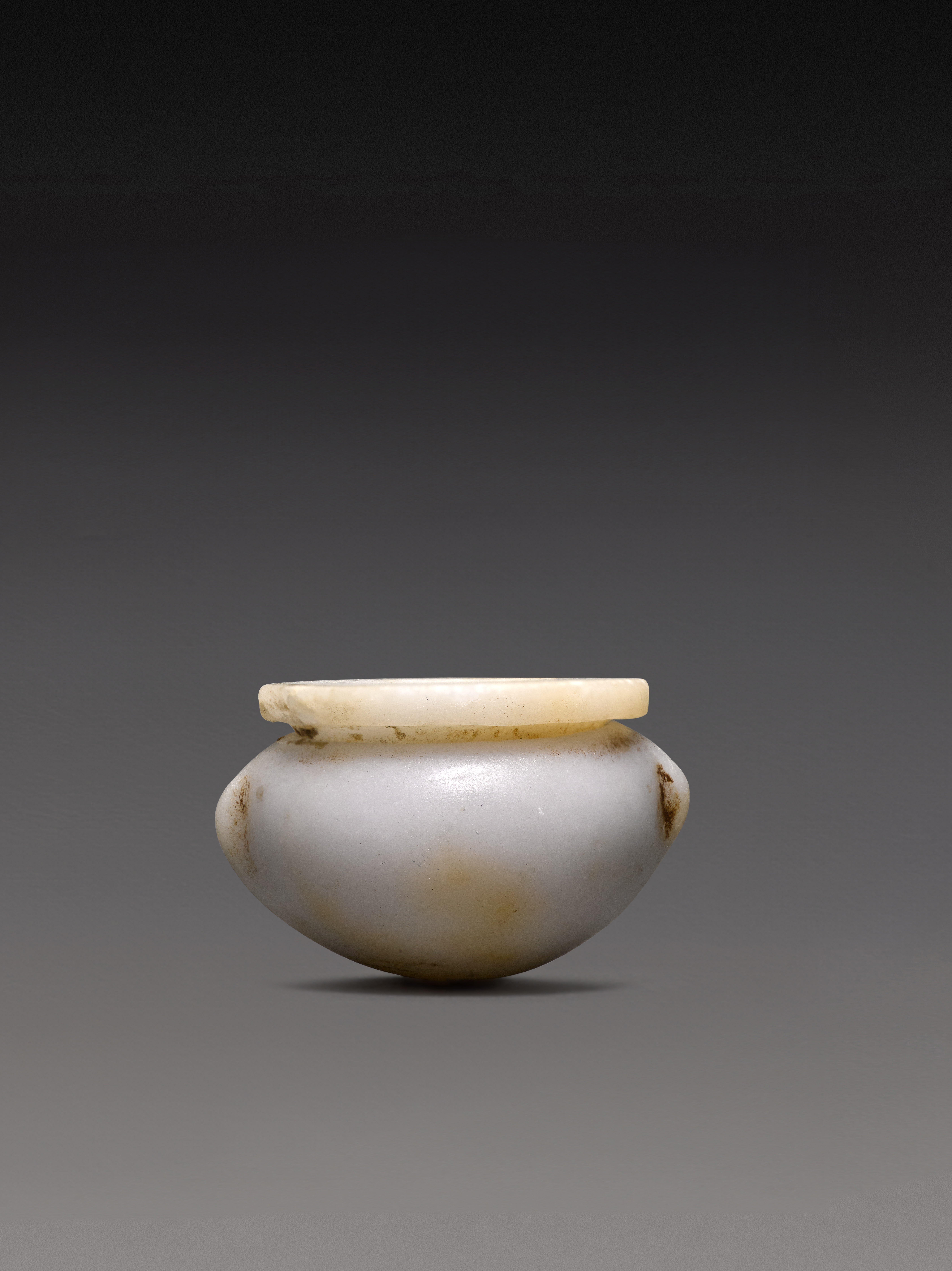 An Egyptian Anhydrite Miniature Cosmetic Vessel — An Egyptian Anhydrite Miniature Cosmetic Vessel, Middle Kingdom, 11th Dynasty, circa 2055-1985 B.C.