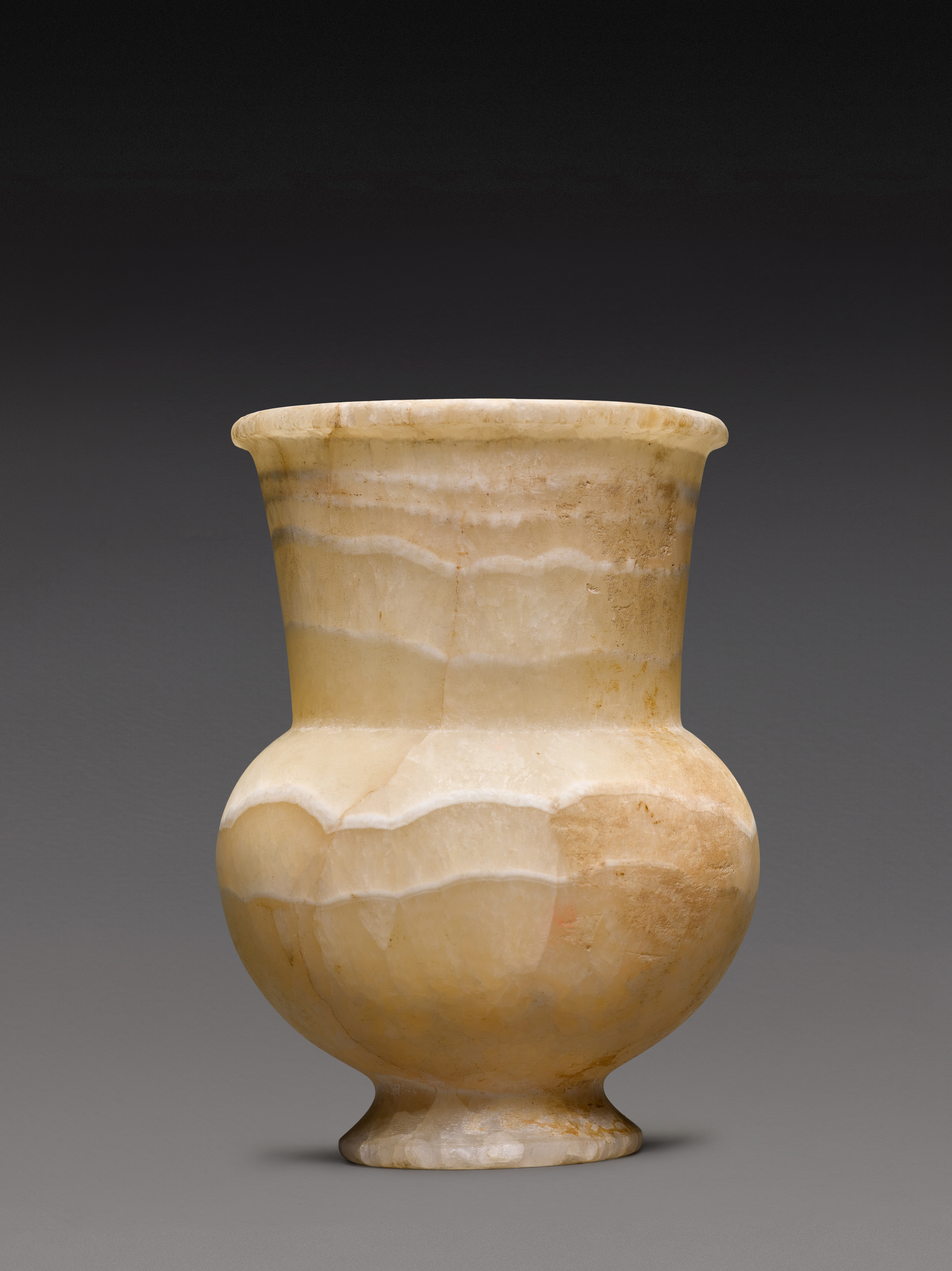 An Egyptian Alabaster Jar — An Egyptian Alabaster Jar, New Kingdom, 18th Dynasty, circa 1550-1295 B.C.