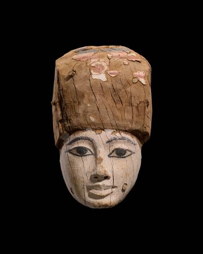 An Egyptian Wood Mummy Mask, 22nd/26th Dynasty, 944-525 B.C.