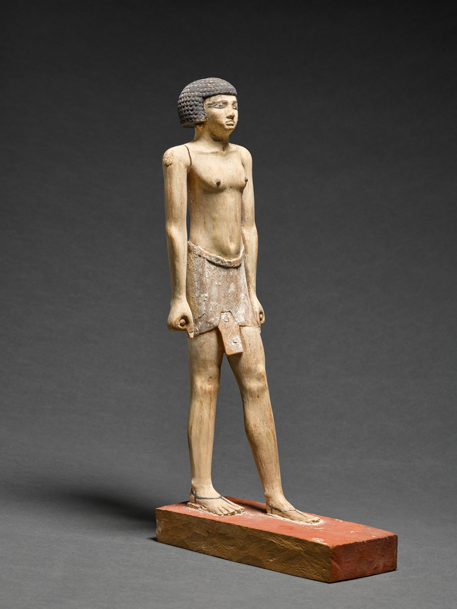 Unknown — An Egyptian Polychrome Wood Figure of a Man, 11th-12th Dynasty, 2081-1759 B.C.