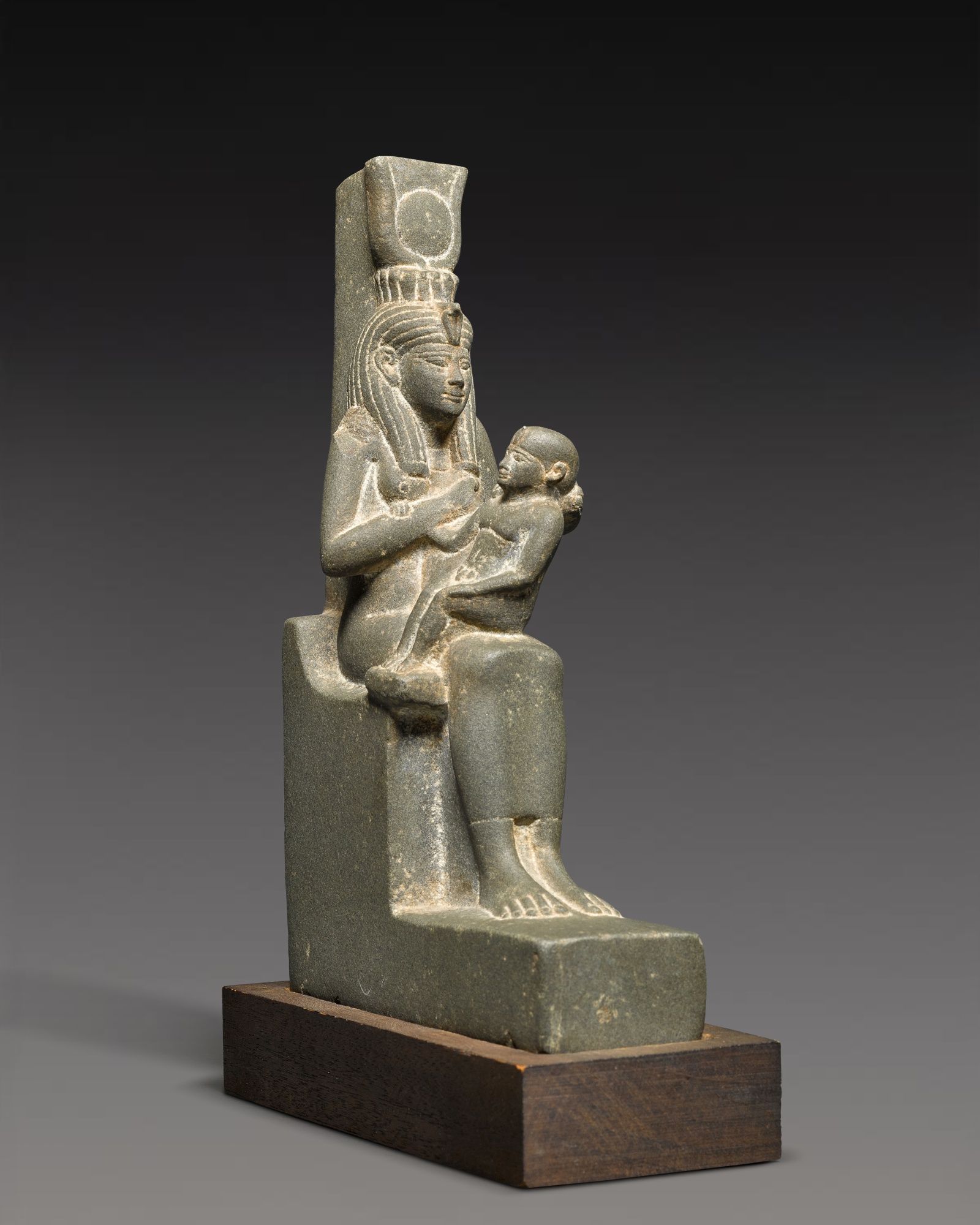 Unknown — An Egyptian Green Schist Figure of Isis and Horus, Late Period, 716-30 B.C.