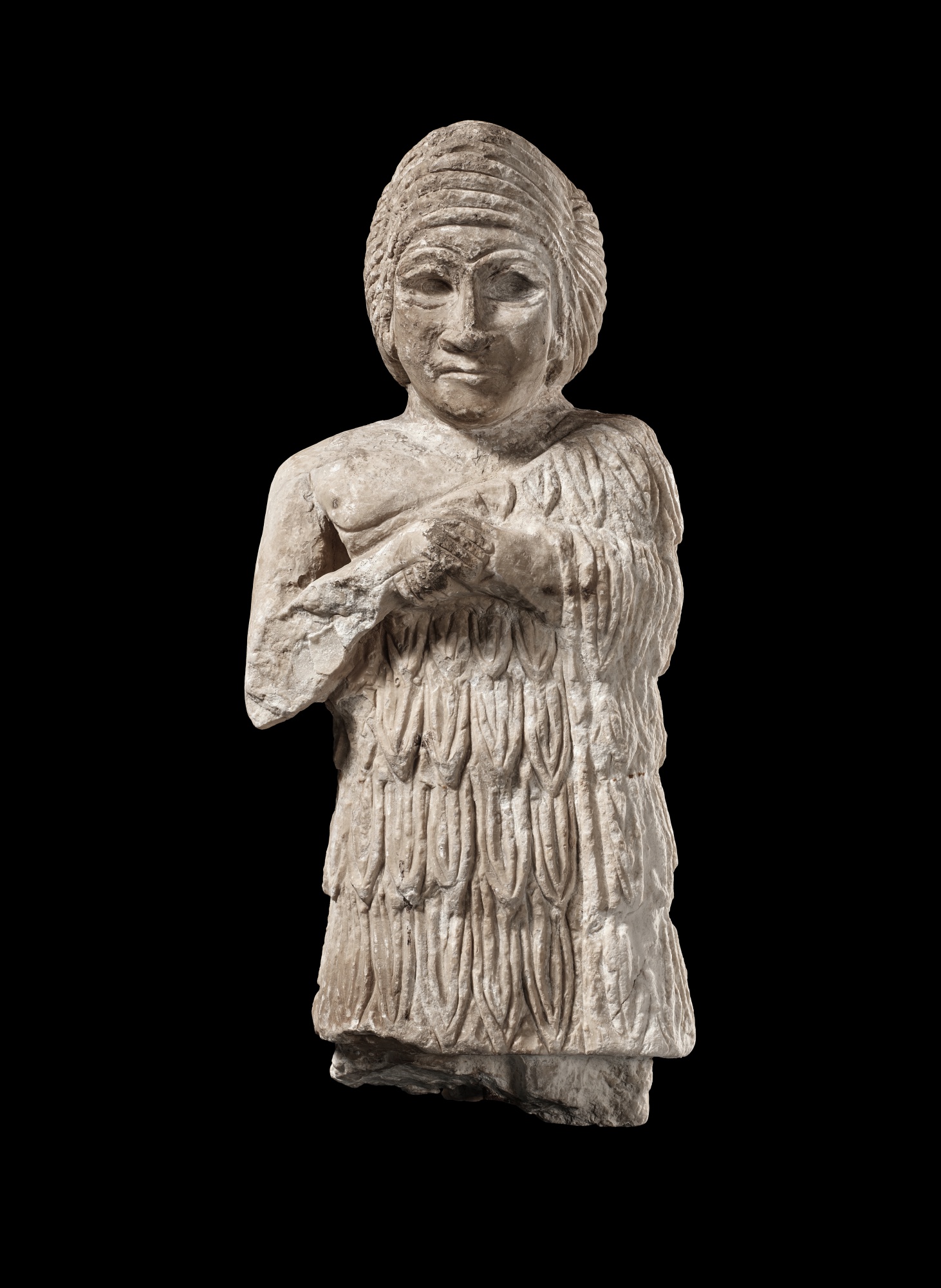 Unknown — A Sumerian Limestone Figure of a Female Worshipper, Early Dynastic, 3rd Millennium B.C.