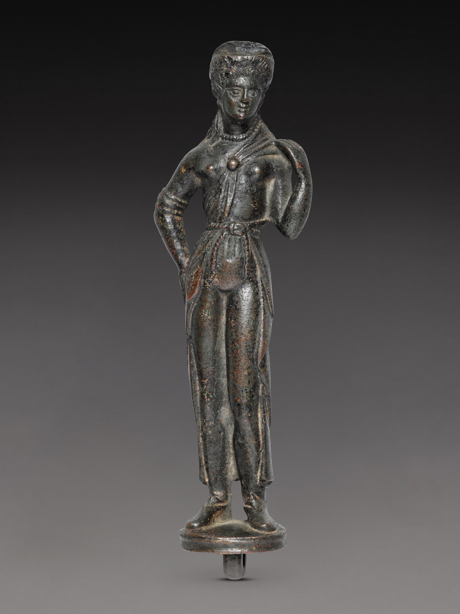 An Etruscan Bronze Patera Handle — An Etruscan Bronze Patera Handle, 4th/3rd Century B.C.