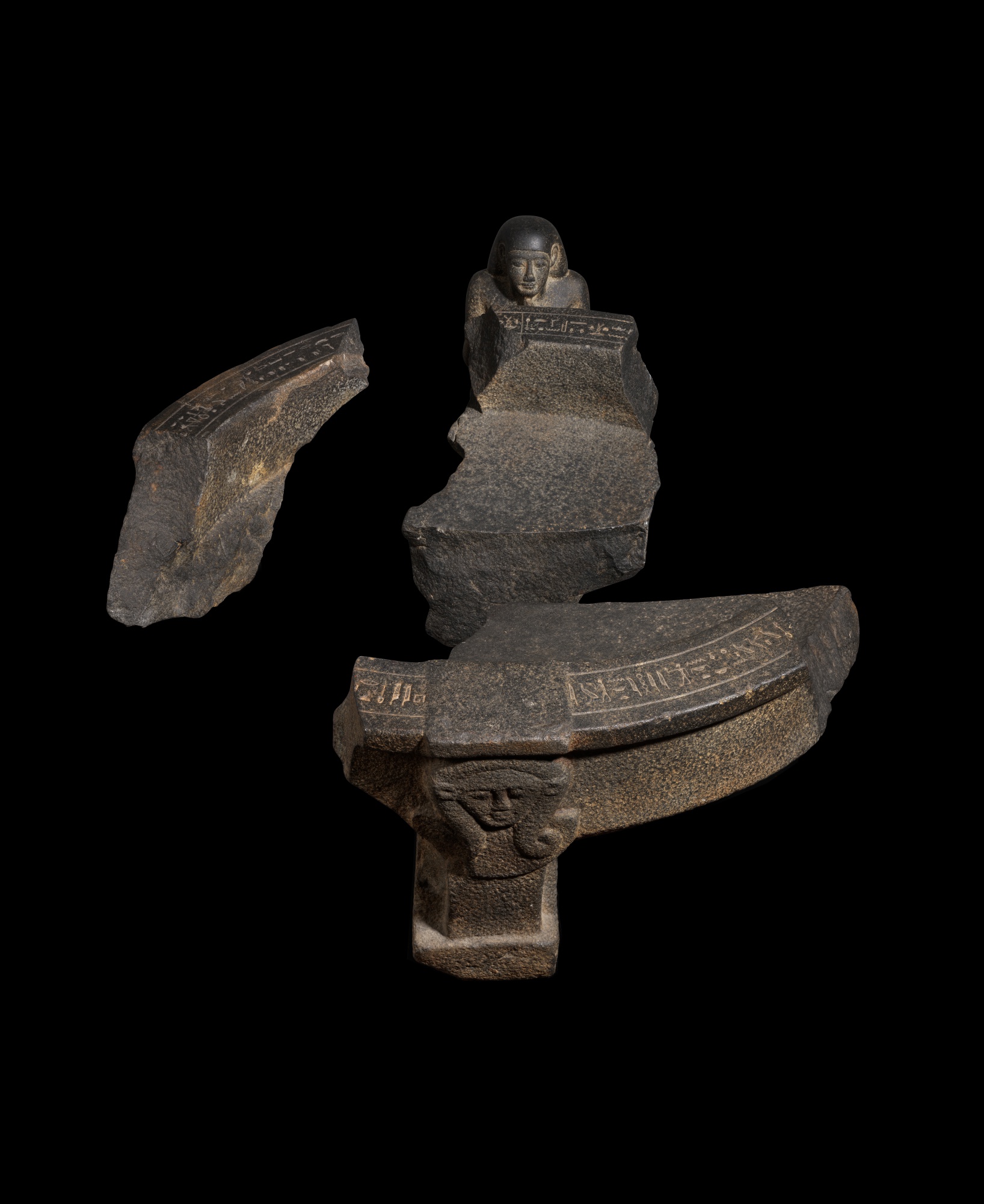 An Egyptian Basalt Basin-bearing Figure of the Customs Chief Wahibre — An Egyptian Basalt Basin-bearing Figure of the Customs Chief Wahibre, Reign of Amasis, 570-526 B.C.