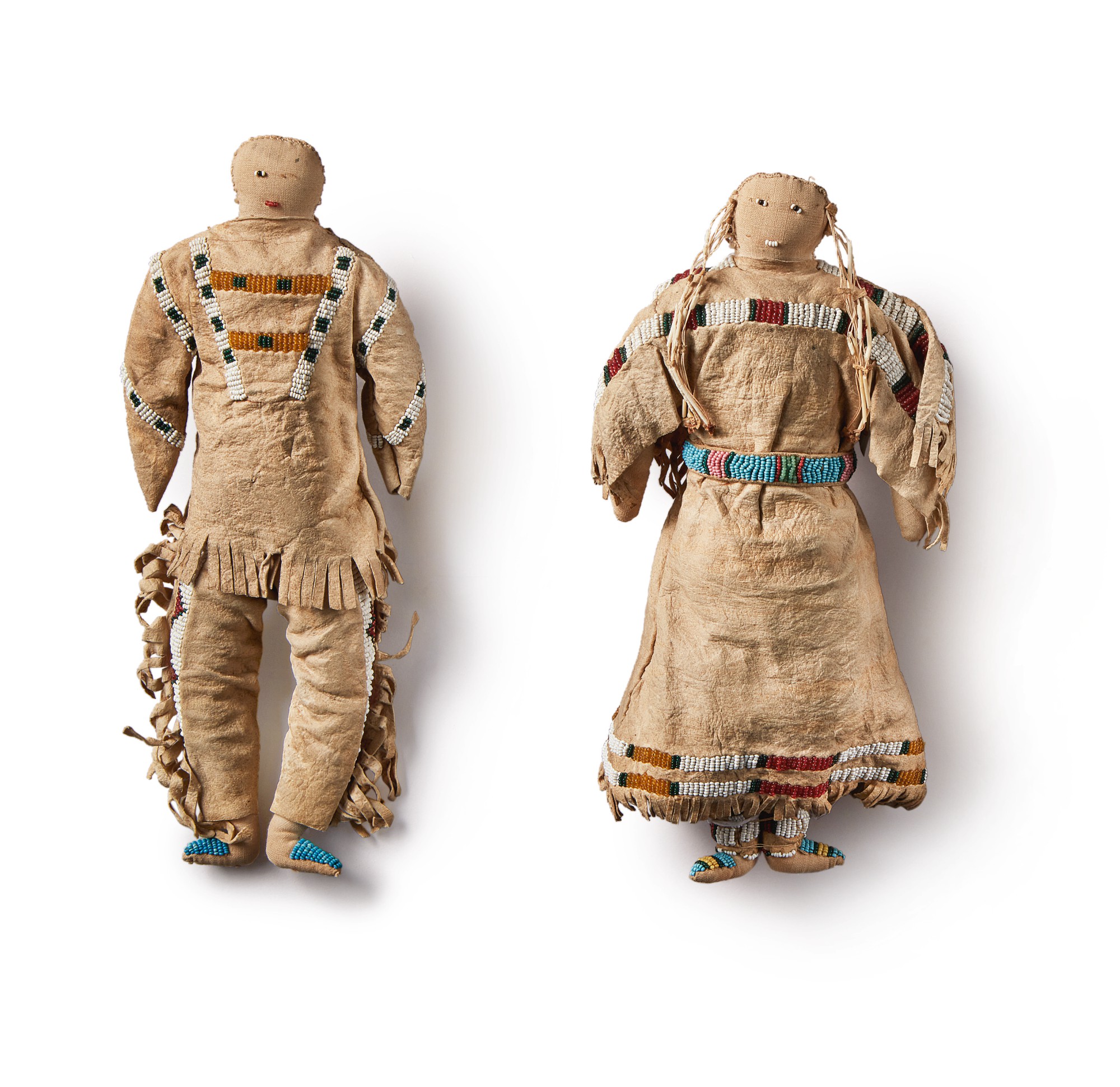Pair of Plains Beaded Hide and Cloth Dolls — Pair of Plains Beaded Hide and Cloth Dolls