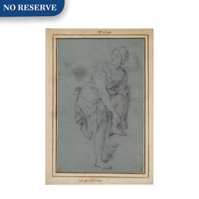 A Young Woman Tying Her Sandals