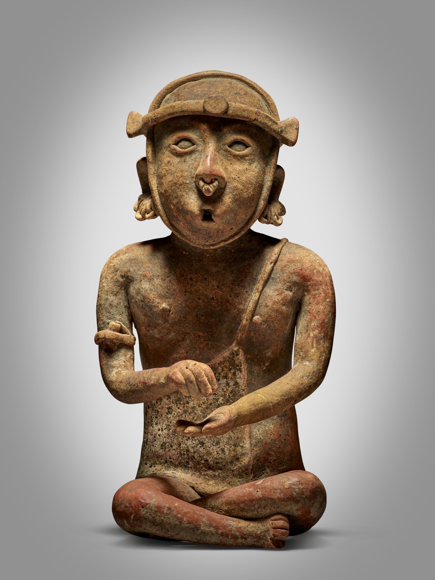 Nayarit Seated Figure with Satchel, Protoclassic, circa 100 BC - AD 250 — Nayarit Seated Figure with Satchel, Protoclassic, circa 100 BC - AD 250