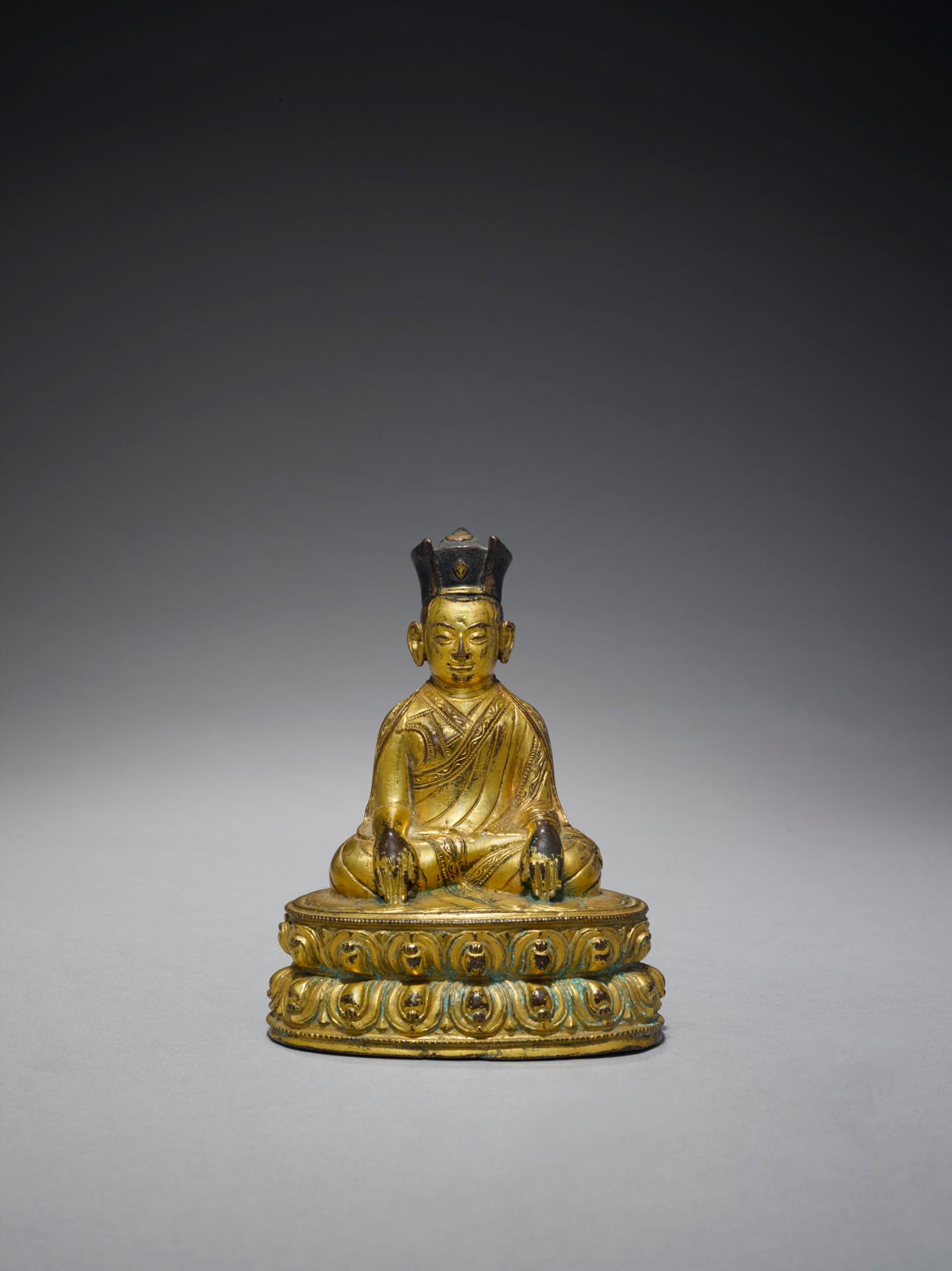 Unknown — A Gilt Copper Alloy Figure of the Third Karmapa, Tibet, 14th Century