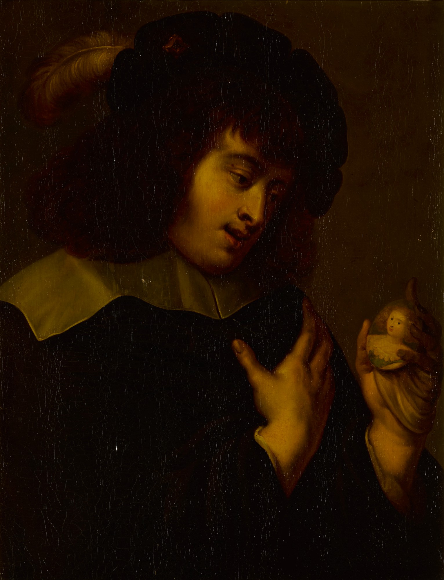 Unknown — Portrait of a gentleman holding a miniature portrait of a lady