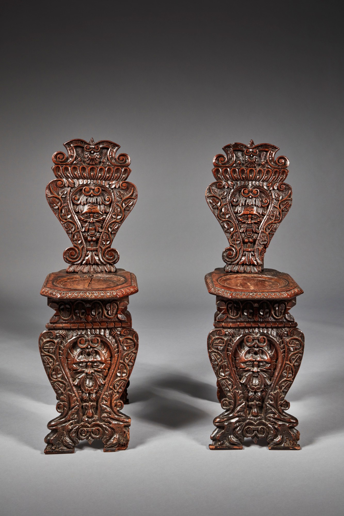 Unknown — Pair of Italian late Renaissance carved walnut sgabelli, Late 16th/Early 17th Century and Later