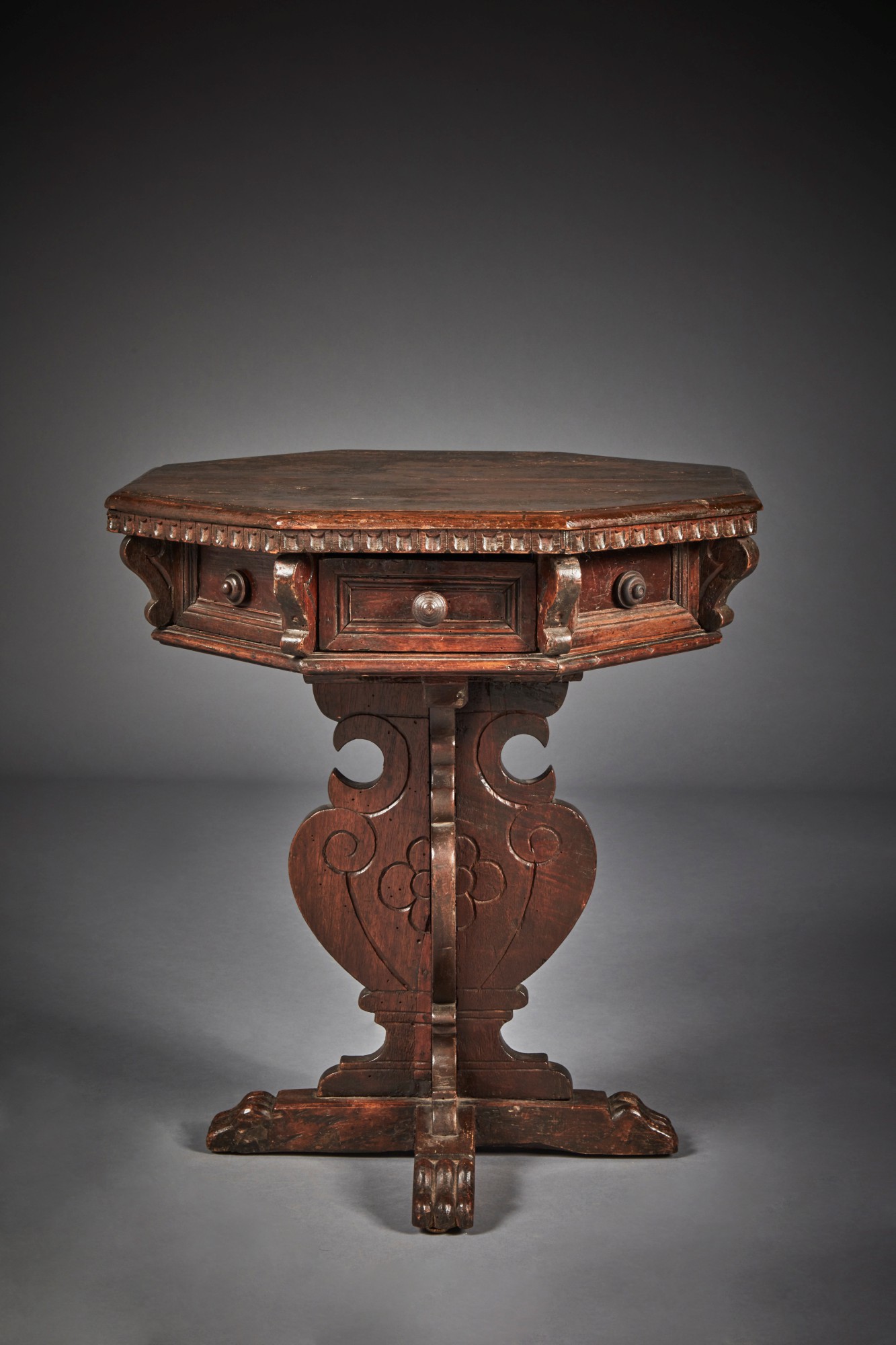 Unknown — Italian Renaissance style carved walnut small octagonal centre table probably 19th century, incorporating earlier elements