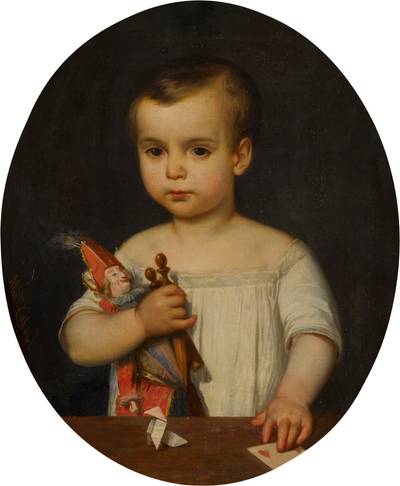 Portrait d’enfant aux jouets