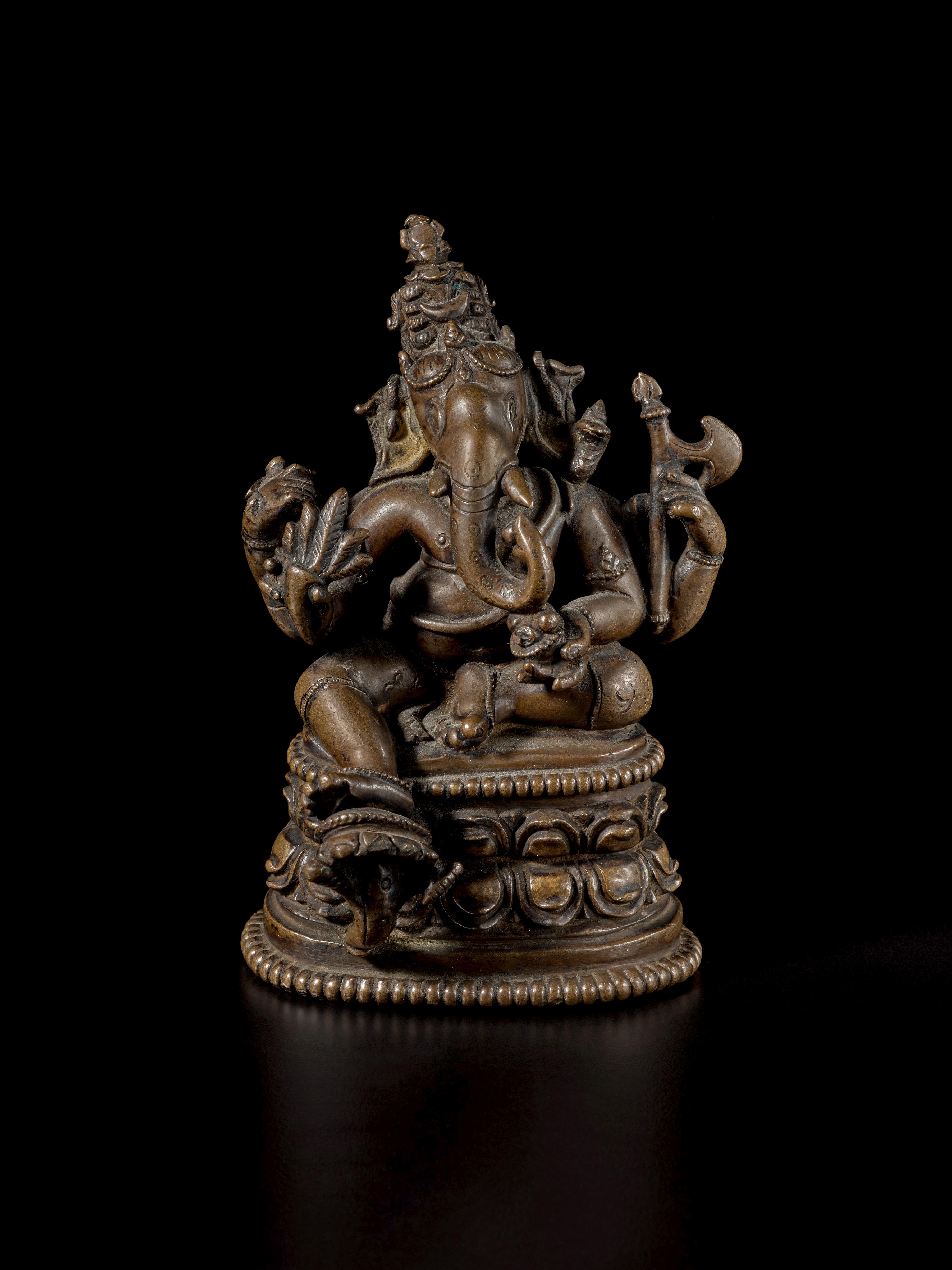 A copper alloy figure of Ganesha — 東印度帕拉 約十二世紀 銅合金象頭神坐像