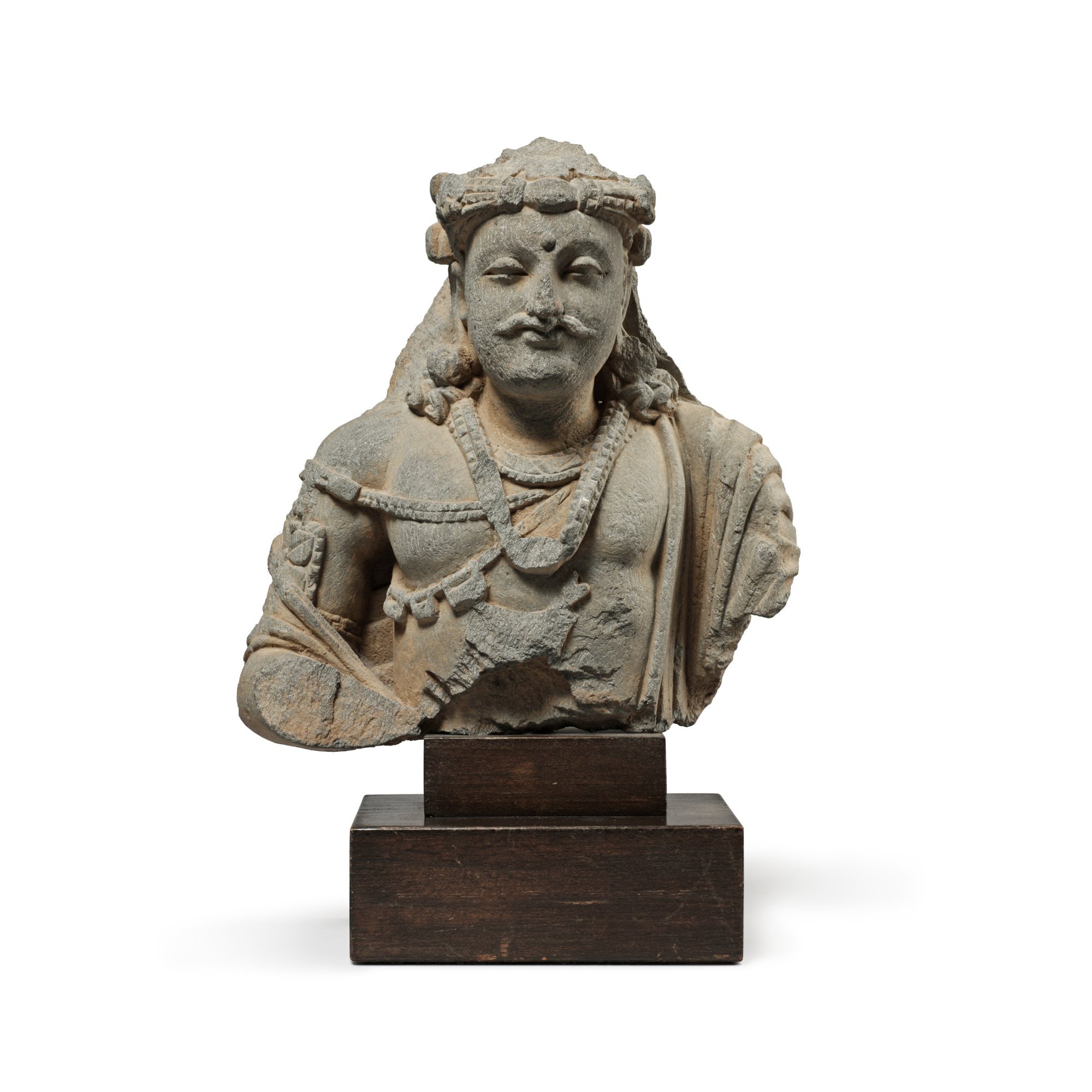A gray schist bust of a bodhisattva — 犍陀羅 約二 / 三世紀 灰片岩雕菩薩半身像